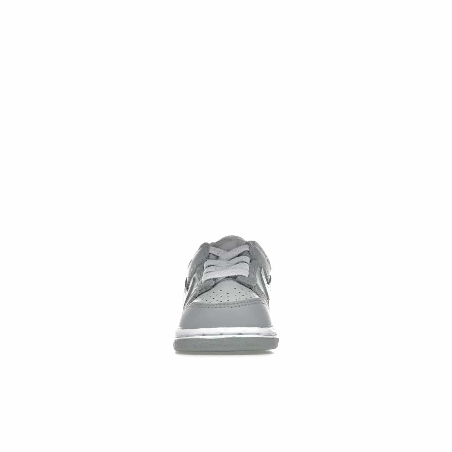 Nike Dunk Low Two-Toned Grey (TD) - Image 10 - Only at www.BallersClubKickz.com - Clean and sharp Nike Dunk Low Two-Toned Grey (TD) release on March 1, 2022. Pure Platinum and White-Wolf Grey design with extra-cushioned midsole for optimal comfort and style.