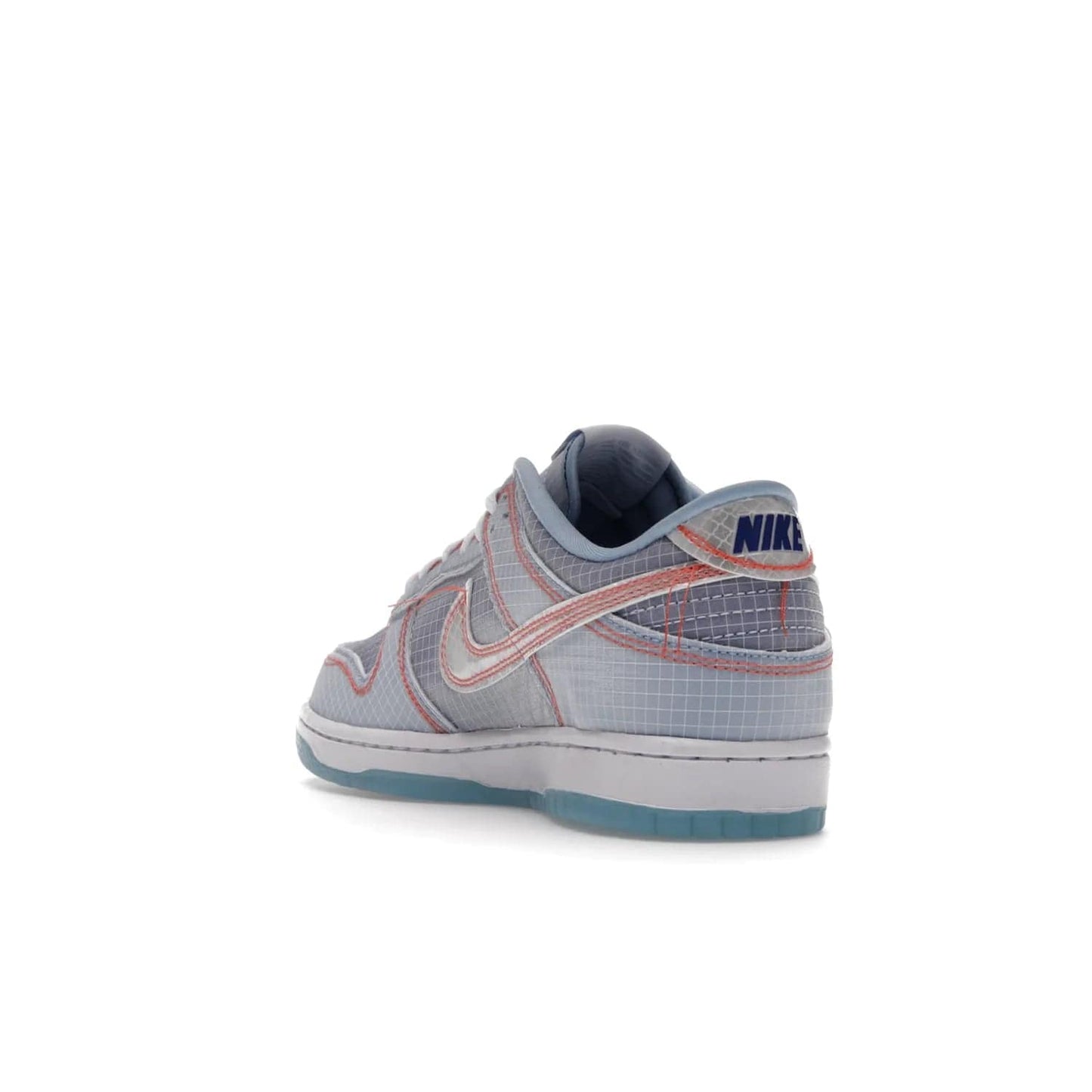 Nike Dunk Low Union Passport Pack Argon - Image 25 - Only at www.BallersClubKickz.com - The Nike Dunk Low Union LA Passport Pack Argon commemorates Chris Gibbs' pick-ups from Japan in the 2000s. Features tonal blue leather, semi-translucent nylon, iconic Union LA Frontman logo. Perfect for luxury collector's! $150.