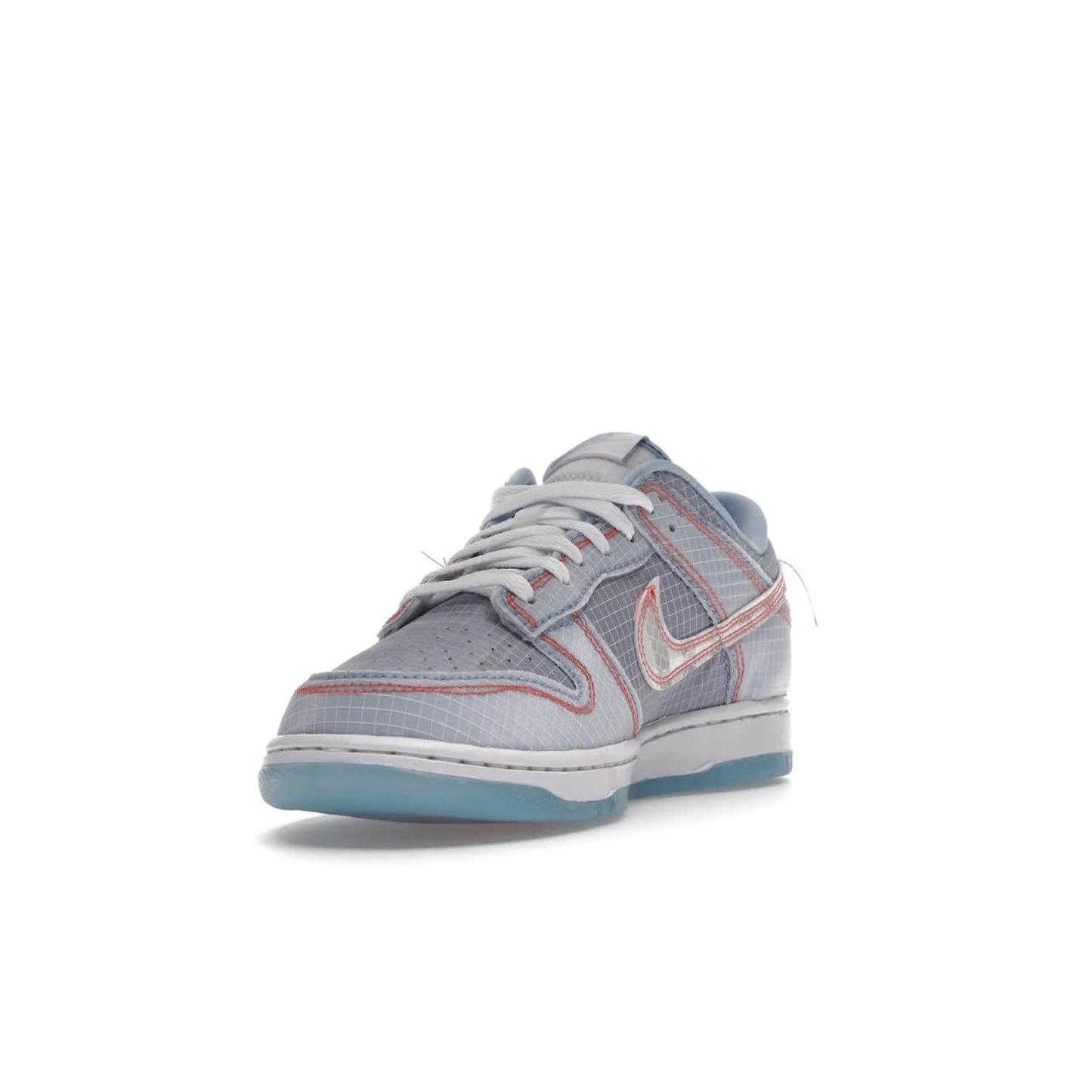 Nike Dunk Low Union Passport Pack Argon - Image 13 - Only at www.BallersClubKickz.com - The Nike Dunk Low Union LA Passport Pack Argon commemorates Chris Gibbs' pick-ups from Japan in the 2000s. Features tonal blue leather, semi-translucent nylon, iconic Union LA Frontman logo. Perfect for luxury collector's! $150.