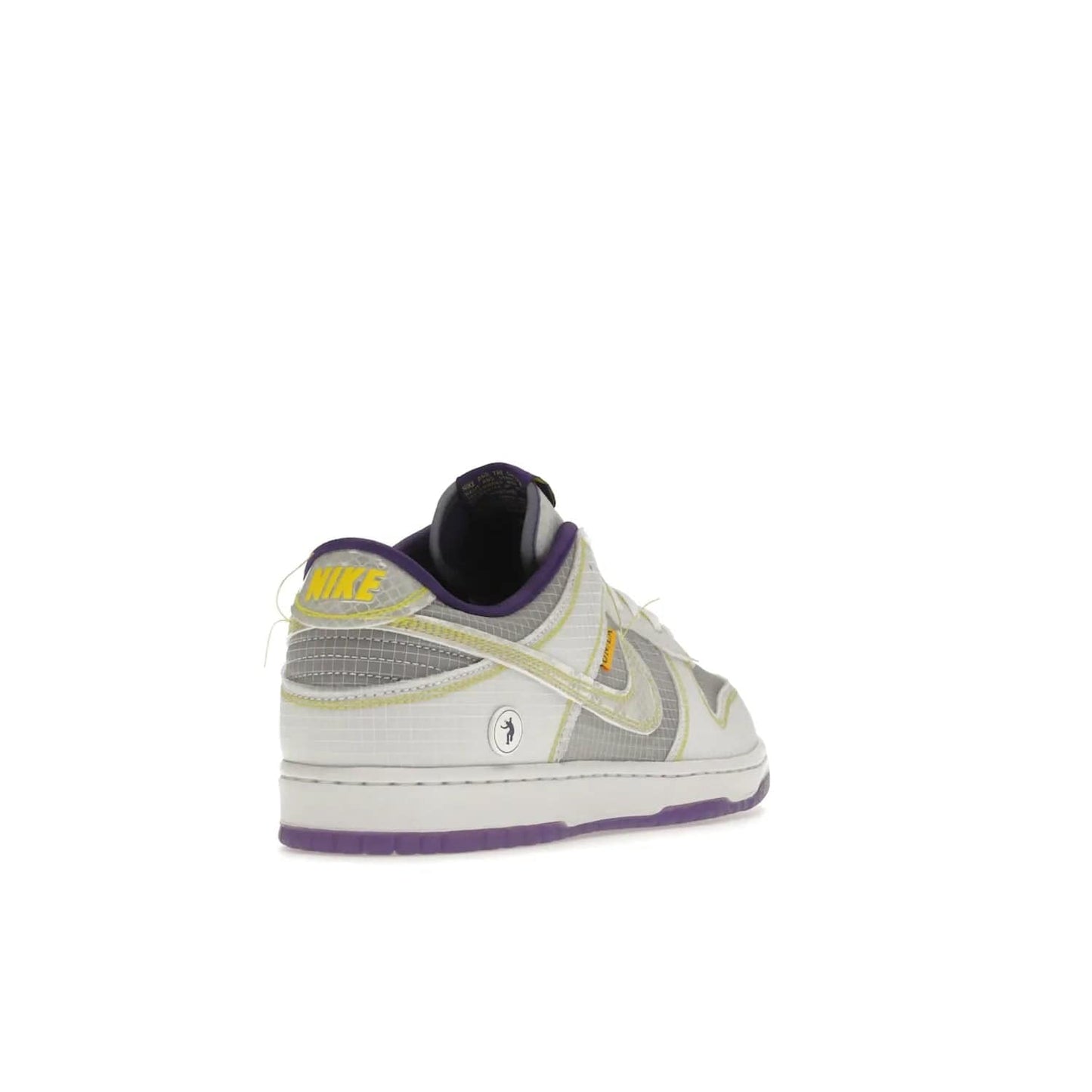 Nike Dunk Low Union Passport Pack Court Purple - Image 31 - Only at www.BallersClubKickz.com - Nike Dunk Low Union LA Passport Pack Court Purple features Court Purple and white smooth leather construction and Union LA Frontman logo on the heel. Releasing in April of 2022, this iconic shoe will make a splash in the streetwear world.