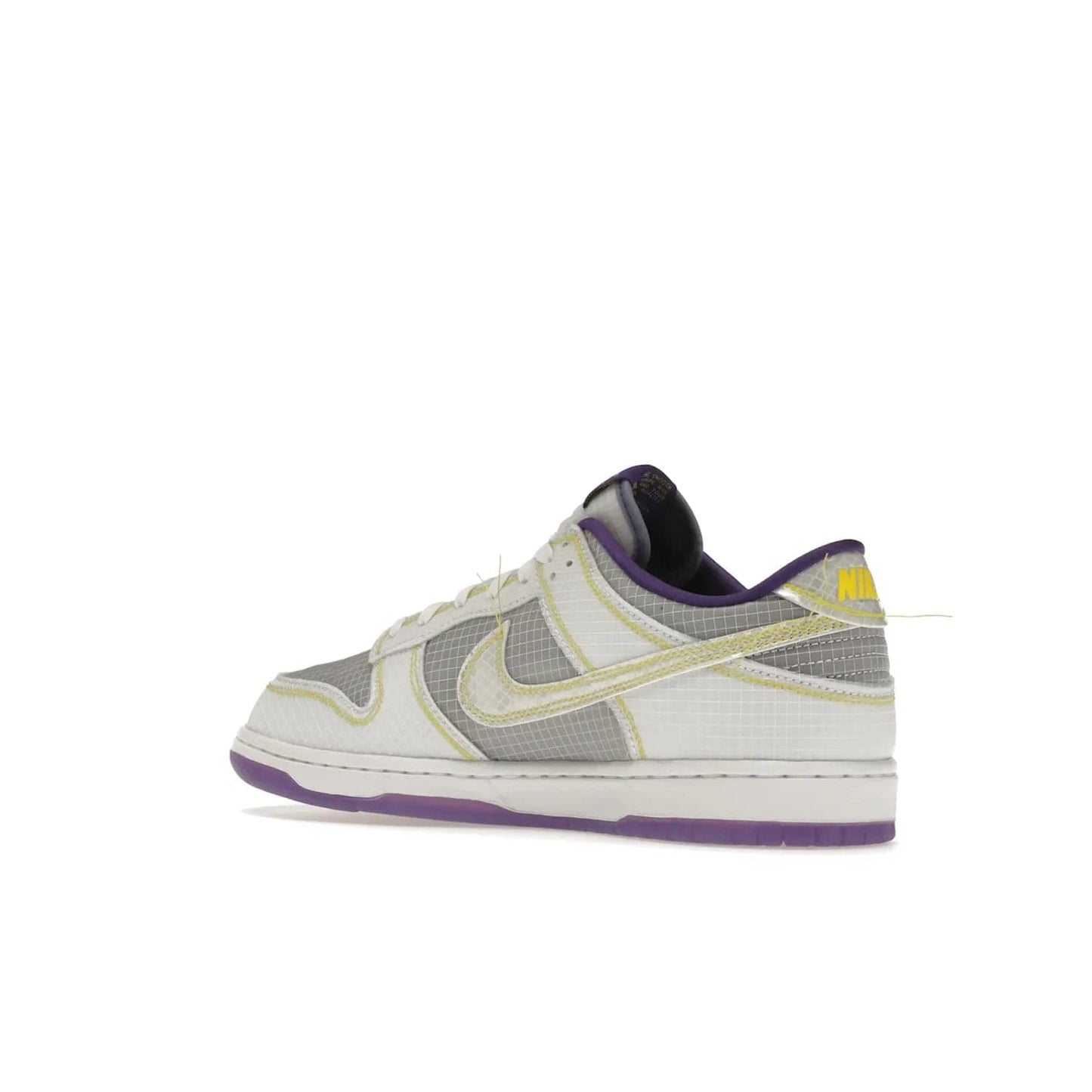 Nike Dunk Low Union Passport Pack Court Purple - Image 23 - Only at www.BallersClubKickz.com - Nike Dunk Low Union LA Passport Pack Court Purple features Court Purple and white smooth leather construction and Union LA Frontman logo on the heel. Releasing in April of 2022, this iconic shoe will make a splash in the streetwear world.