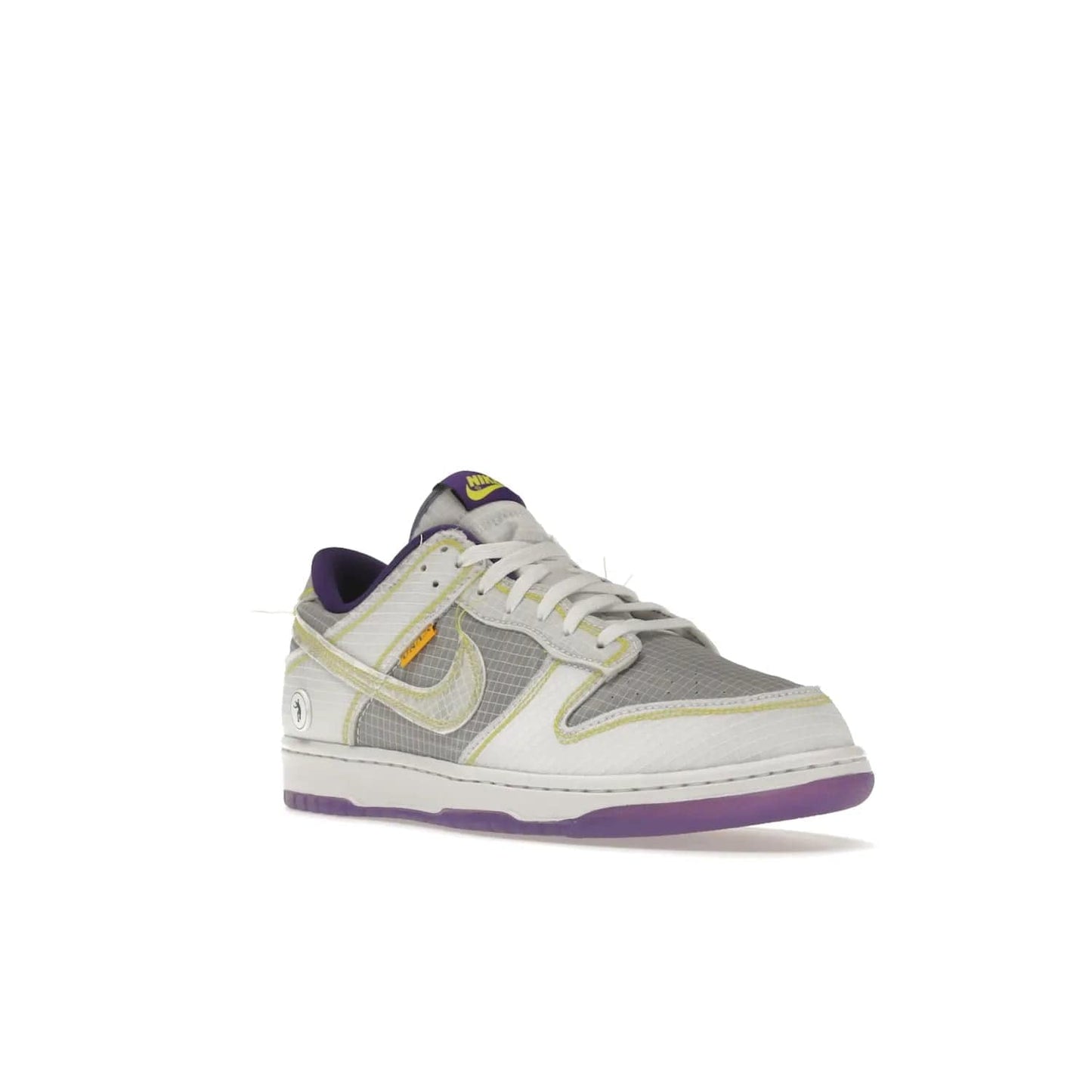 Nike Dunk Low Union Passport Pack Court Purple - Image 6 - Only at www.BallersClubKickz.com - Nike Dunk Low Union LA Passport Pack Court Purple features Court Purple and white smooth leather construction and Union LA Frontman logo on the heel. Releasing in April of 2022, this iconic shoe will make a splash in the streetwear world.