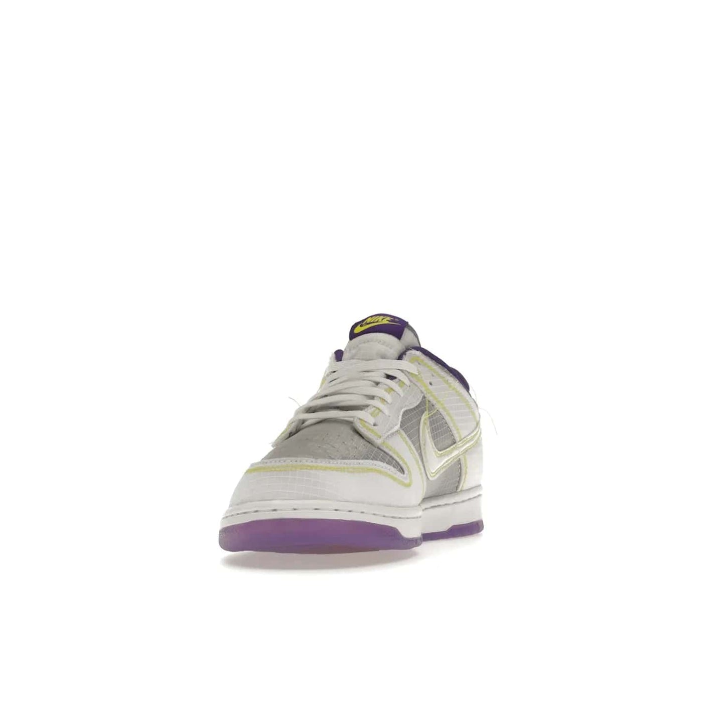 Nike Dunk Low Union Passport Pack Court Purple - Image 12 - Only at www.BallersClubKickz.com - Nike Dunk Low Union LA Passport Pack Court Purple features Court Purple and white smooth leather construction and Union LA Frontman logo on the heel. Releasing in April of 2022, this iconic shoe will make a splash in the streetwear world.