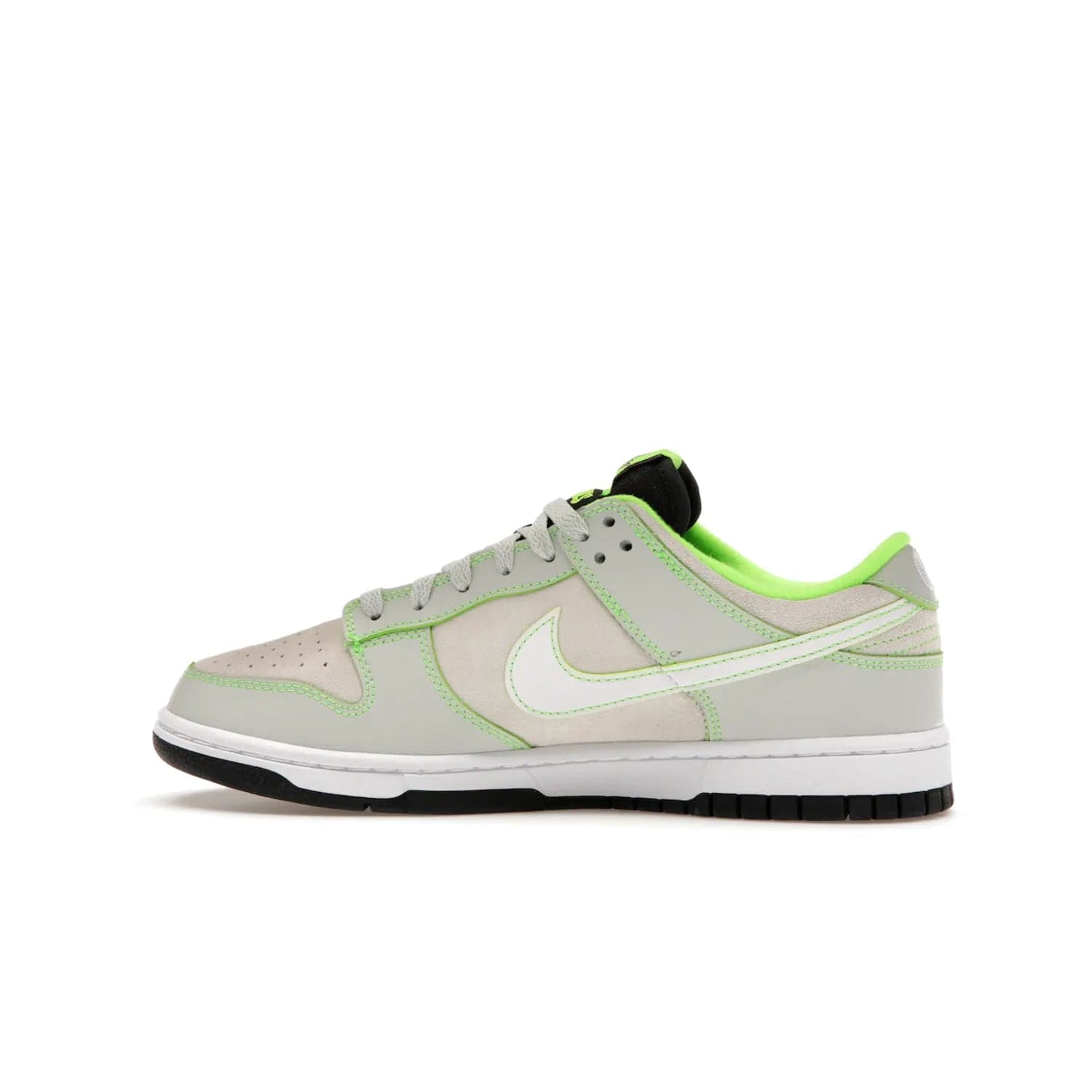 Nike Dunk Low University of Oregon PE (2023) - Image 20 - Only at www.BallersClubKickz.com - Sleek Light Silver and White upper, complemented by Black and Electric Green accents. Nike Dunk Low University of Oregon PE, set to be released April 2023. Must-have for any serious fan.