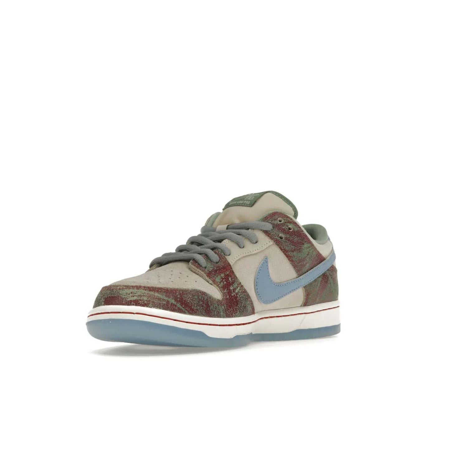 Nike SB Dunk Low Crenshaw Skate Club - Image 14 - Only at www.BallersClubKickz.com - Introducing the Nike SB Dunk Low Crenshaw Skate Club! Classic skate shoes with Sail and Light Blue upper, Cedar accents, padded collars and superior grip for comfortable, stable performance and style. Ideal for any skate session.