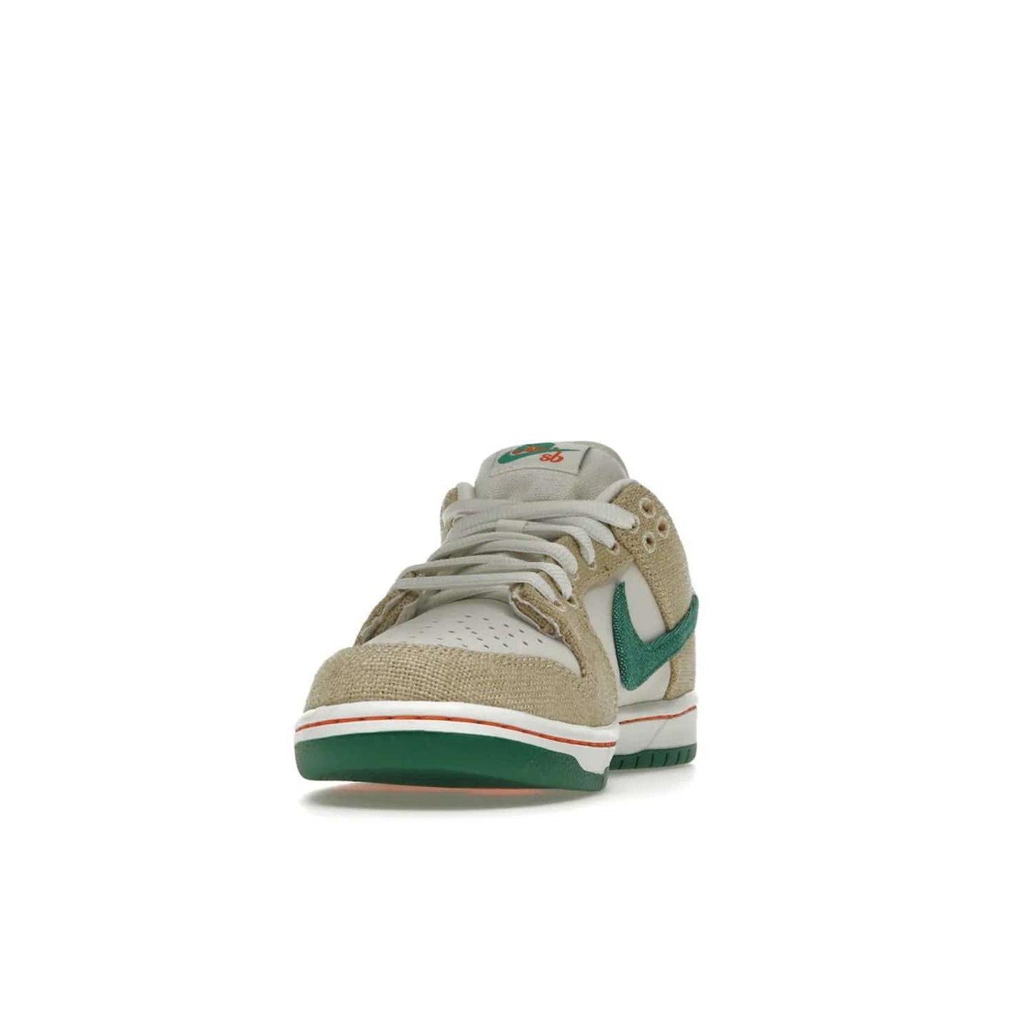 Nike SB Dunk Low Jarritos - Image 12 - Only at www.BallersClubKickz.com - Shop limited edition Nike SB Dunk Low Jarritos! Crafted with white leather and tear-away canvas materials with green accents. Includes orange, green, and white laces to customize your look. Available now.