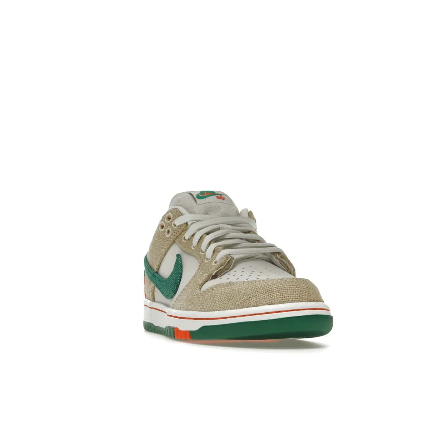 Nike SB Dunk Low Jarritos - Image 8 - Only at www.BallersClubKickz.com - Shop limited edition Nike SB Dunk Low Jarritos! Crafted with white leather and tear-away canvas materials with green accents. Includes orange, green, and white laces to customize your look. Available now.