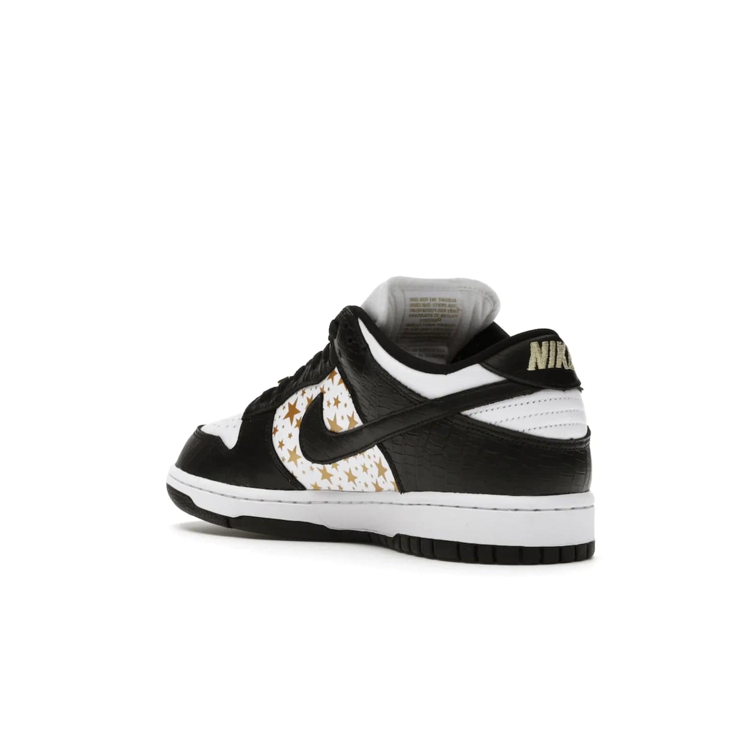 Nike SB Dunk Low Supreme Stars Black (2021) - Image 24 - Only at www.BallersClubKickz.com - Retro style and signature details make the Nike SB Dunk Low Supreme Black a must-have. This special edition shoe features a white leather upper and black croc skin overlays complemented by gold stars and deubré. Enjoy a piece of SB history and grab yours today.