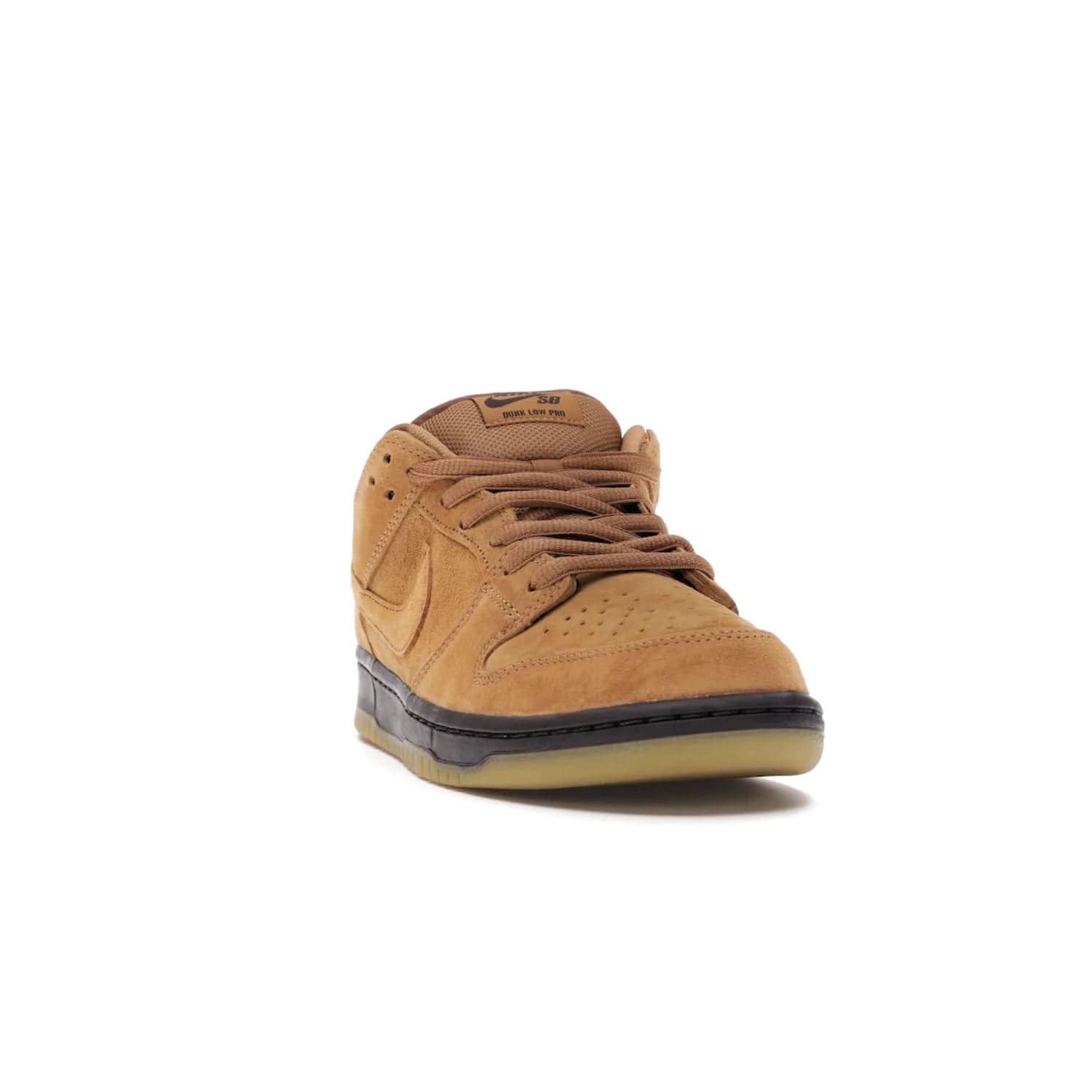 Nike SB Dunk Low Wheat (2021/2023) - Image 8 - Only at www.BallersClubKickz.com - The Nike SB Dunk Low Wheat (2021/2023)has a sleek silhouette and wheat suede upper. Tan tones for lining, mesh tongues, and laces. Iconic color palette midsole, perforated boxing toe. Brown branding on tongue and heel. Gum rubber outsole with partitioned pattern for traction. Eschewed in Feb 2021 for $110.