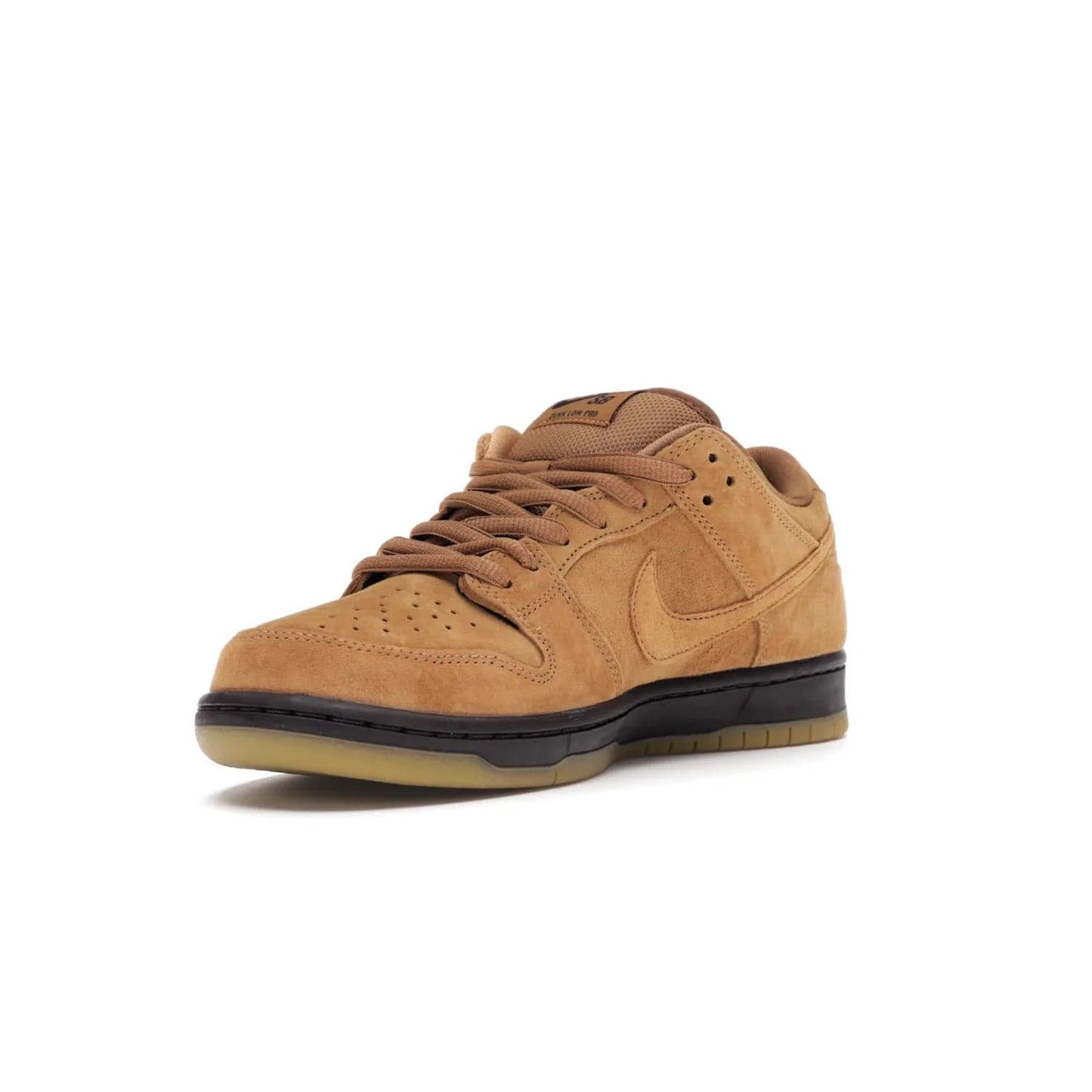 Nike SB Dunk Low Wheat (2021/2023) - Image 14 - Only at www.BallersClubKickz.com - The Nike SB Dunk Low Wheat (2021/2023)has a sleek silhouette and wheat suede upper. Tan tones for lining, mesh tongues, and laces. Iconic color palette midsole, perforated boxing toe. Brown branding on tongue and heel. Gum rubber outsole with partitioned pattern for traction. Eschewed in Feb 2021 for $110.