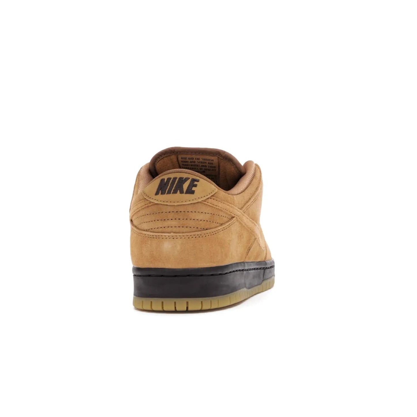 Nike SB Dunk Low Wheat (2021/2023) - Image 29 - Only at www.BallersClubKickz.com - The Nike SB Dunk Low Wheat (2021/2023)has a sleek silhouette and wheat suede upper. Tan tones for lining, mesh tongues, and laces. Iconic color palette midsole, perforated boxing toe. Brown branding on tongue and heel. Gum rubber outsole with partitioned pattern for traction. Eschewed in Feb 2021 for $110.