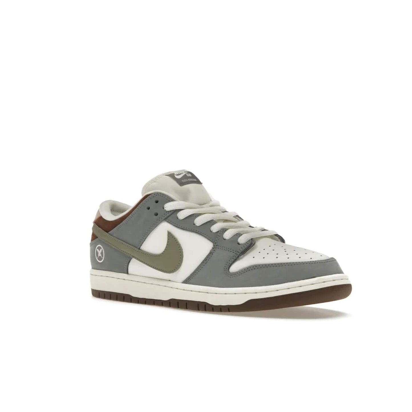 Nike SB Dunk Low Yuto Horigome - Image 5 - Only at www.BallersClubKickz.com - Introducing the Nike SB Dunk Low Yuto Horigome! Co-designed with the skater himself, it features Wolf Grey, Iron Grey, and Sail accents. Comfort and style for everyday wear, plus perfect for skate sessions. Get yours August 29, 2023!