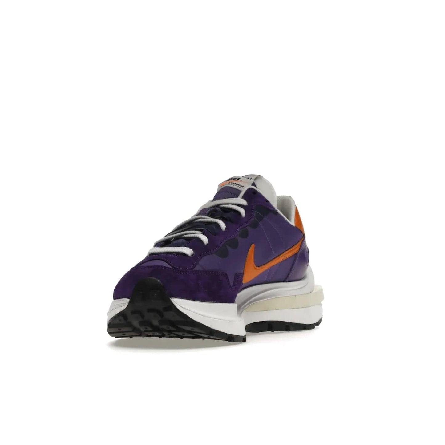 Nike Vaporwaffle sacai Dark Iris - Image 13 - Only at www.BallersClubKickz.com - Unique Nike Vaporwaffle sacai Dark Iris collab. Suede, leather & textile upper with Orange accents. Dual tongues & midsoles. Woven labels & heel tabs branding. Colorway of Purple, Orange, White & Black. Must-have for any wardrobe.