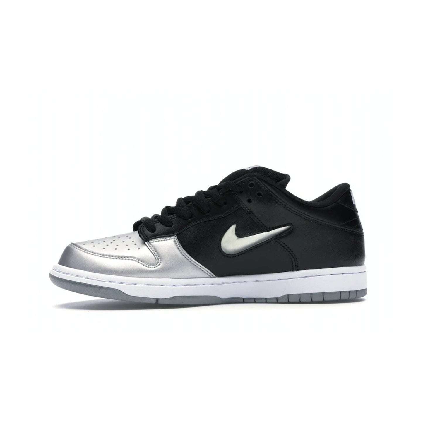 Nike SB Dunk Low Supreme Jewel Swoosh Silver - Image 18 - Only at www.BallersClubKickz.com - This Metallic Silver/Metallic Silver-Black Nike SB Dunk Low Supreme Jewel Swoosh Silver brings a flashy design to the iconic SB Dunk. Released in 2019, this is a must-have for any collection.