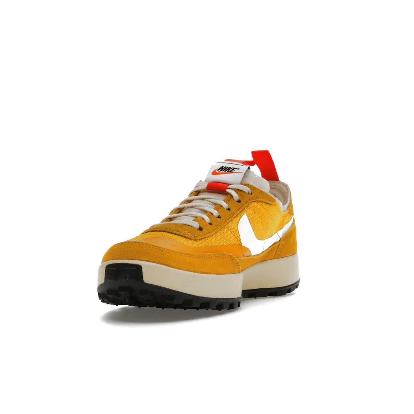 NikeCraft General Purpose Shoe Tom Sachs Archive Dark Sulfur - Image 13 - Only at www.BallersClubKickz.com - Collab between Nike & Tom Sachs. The NikeCraft General Purpose Shoe features dark sulfur mesh upper, suede overlays, contrasting white Swoosh and orange tabs. EVA cushioning & black waffle-traction rubber outsole ensures performance. Stylish & perfect for any occasion, the shoe released September 2, 2022.