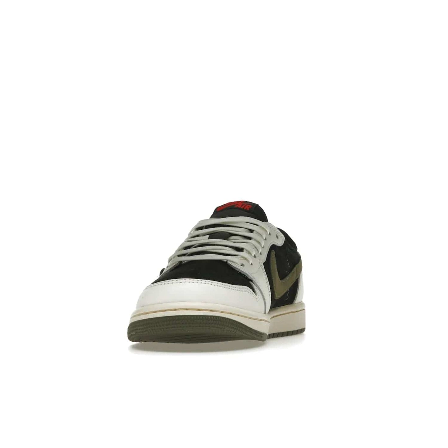 Jordan 1 Retro Low OG SP Travis Scott Olive (Women's) - Image 12 - Only at www.BallersClubKickz.com - Score style points with the Air Jordan 1 Retro Low OG SP Travis Scott Olive exclusively in womens sizing. White leather and black nubuck uppers, plus signature reverse style Nike Swoosh and aged midsole atop olive green outsole. Stand out with these stylish and eye-catching sneakers, dropping April 26, 2023.