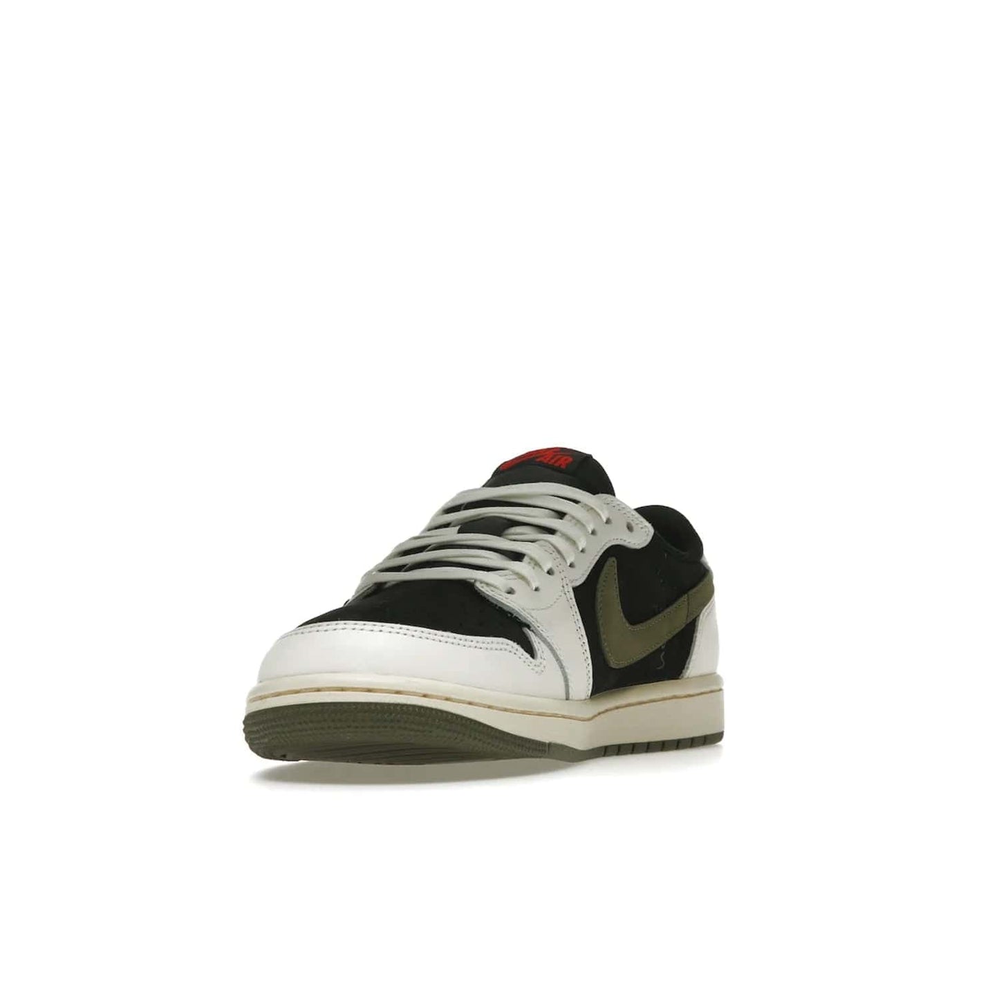 Jordan 1 Retro Low OG SP Travis Scott Olive (Women's) - Image 13 - Only at www.BallersClubKickz.com - Score style points with the Air Jordan 1 Retro Low OG SP Travis Scott Olive exclusively in womens sizing. White leather and black nubuck uppers, plus signature reverse style Nike Swoosh and aged midsole atop olive green outsole. Stand out with these stylish and eye-catching sneakers, dropping April 26, 2023.