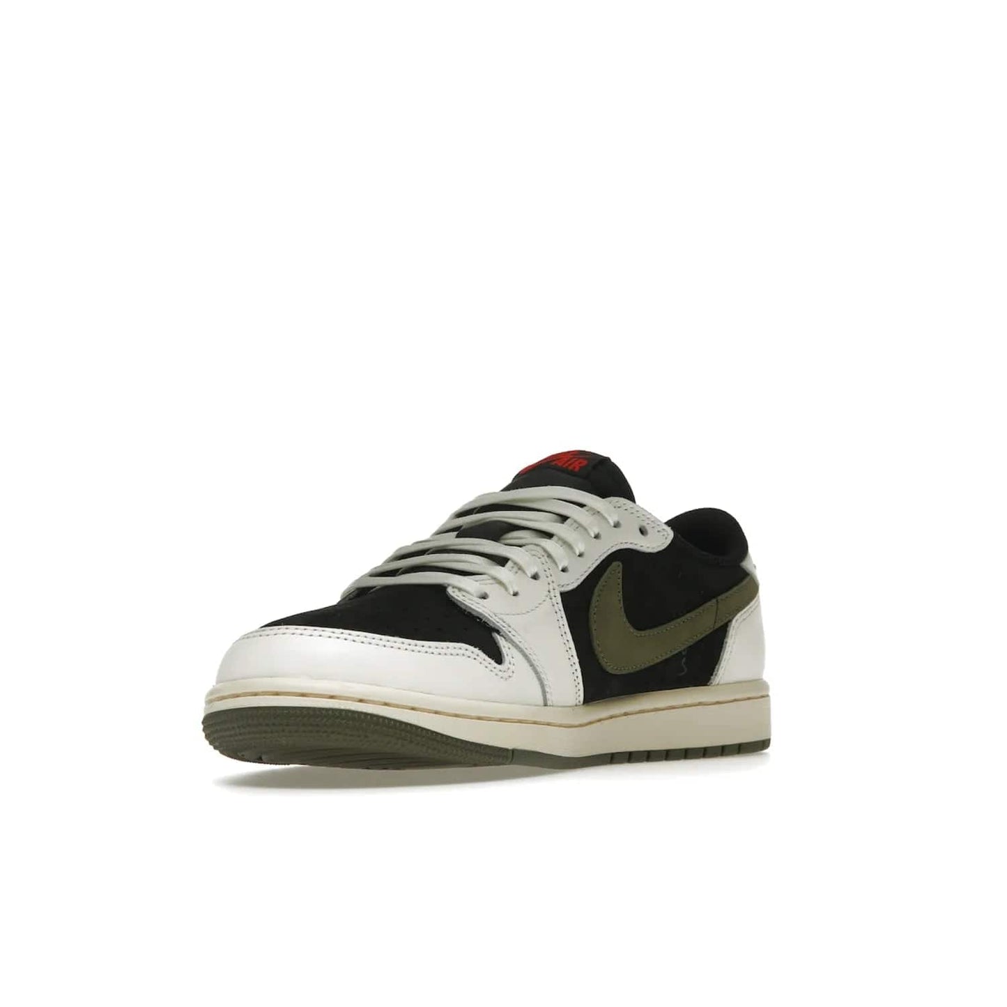 Jordan 1 Retro Low OG SP Travis Scott Olive (Women's) - Image 14 - Only at www.BallersClubKickz.com - Score style points with the Air Jordan 1 Retro Low OG SP Travis Scott Olive exclusively in womens sizing. White leather and black nubuck uppers, plus signature reverse style Nike Swoosh and aged midsole atop olive green outsole. Stand out with these stylish and eye-catching sneakers, dropping April 26, 2023.