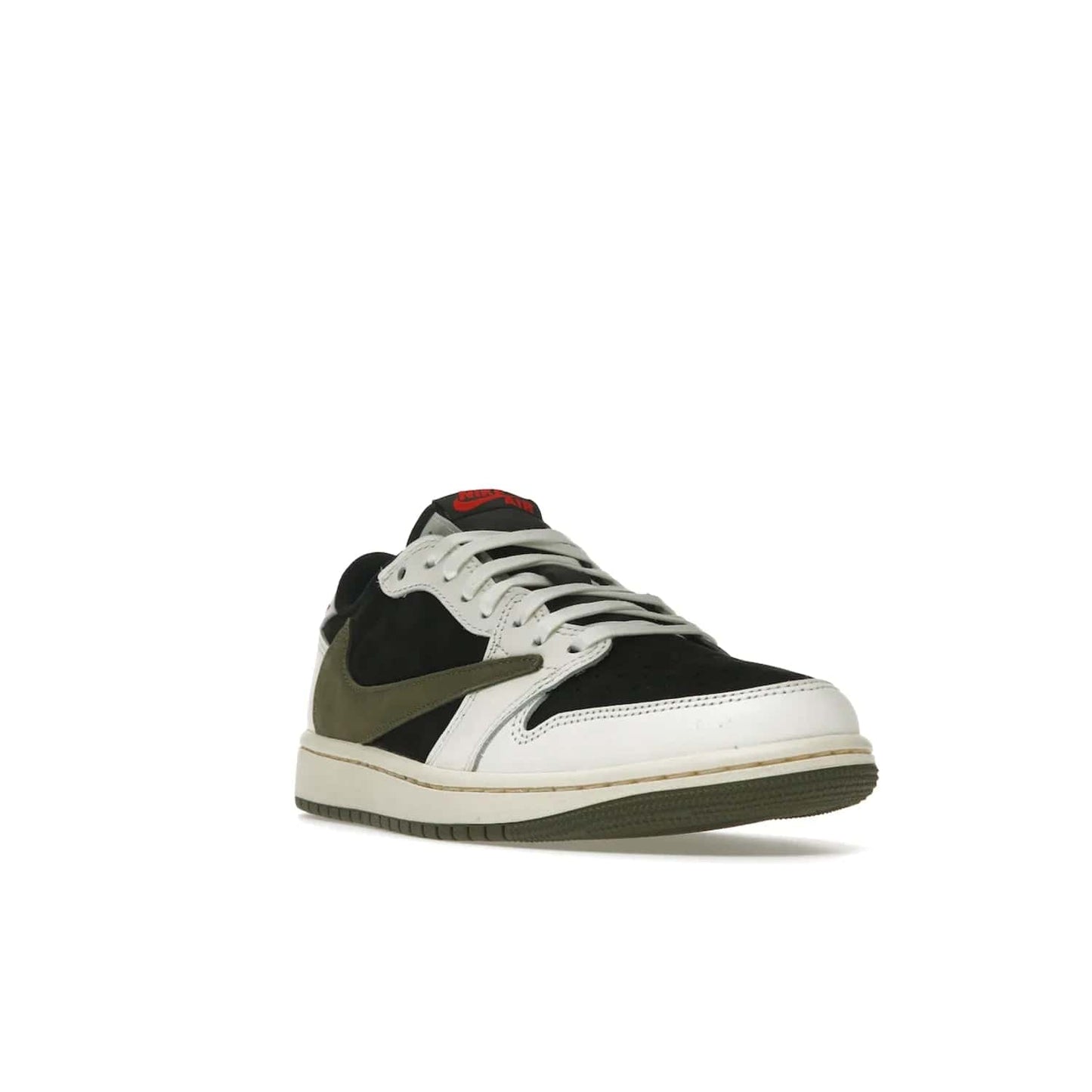 Jordan 1 Retro Low OG SP Travis Scott Olive (Women's) - Image 7 - Only at www.BallersClubKickz.com - Score style points with the Air Jordan 1 Retro Low OG SP Travis Scott Olive exclusively in womens sizing. White leather and black nubuck uppers, plus signature reverse style Nike Swoosh and aged midsole atop olive green outsole. Stand out with these stylish and eye-catching sneakers, dropping April 26, 2023.
