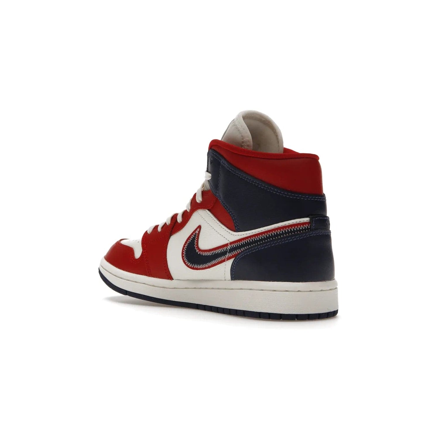 Jordan 1 Mid USA (2022) (Women's) - Image 24 - Only at www.BallersClubKickz.com - A bold mosaic of bright red and navy. Step up your game with the Jordan 1 Mid. Showcase the iconic "Wings" logo, classic Jumpman midsole, and go for the gold!