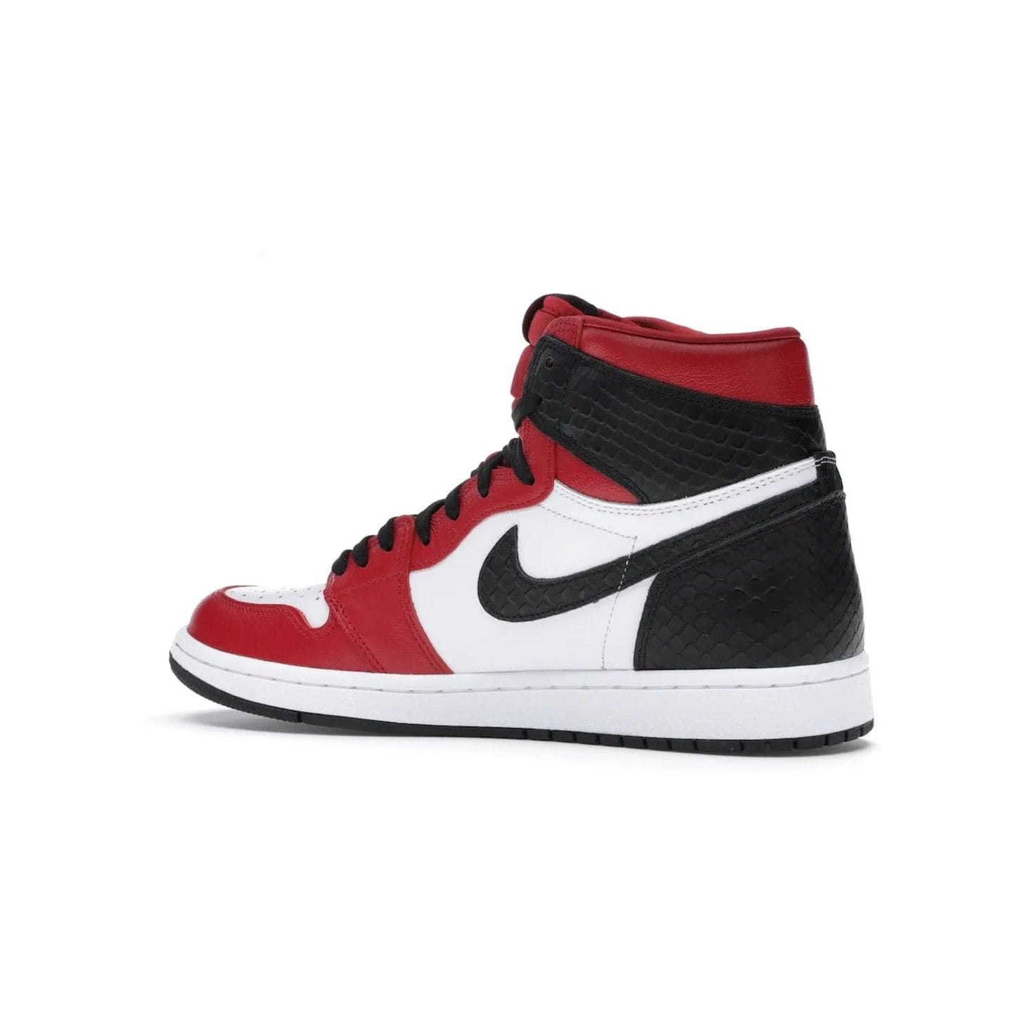 Jordan 1 Retro High Satin Snake Chicago (Women's) - Image 22 - Only at www.BallersClubKickz.com - Upscale Jordan 1 Retro High Satin Snake Chicago (Women's). Crafted from red and white leather with faux snakeskin details and red satin. Jordan Wings graphic on the ankle, white midsole, and striking red outsole. August 2020 release. Iconic shoes must-have for sneaker collectors.