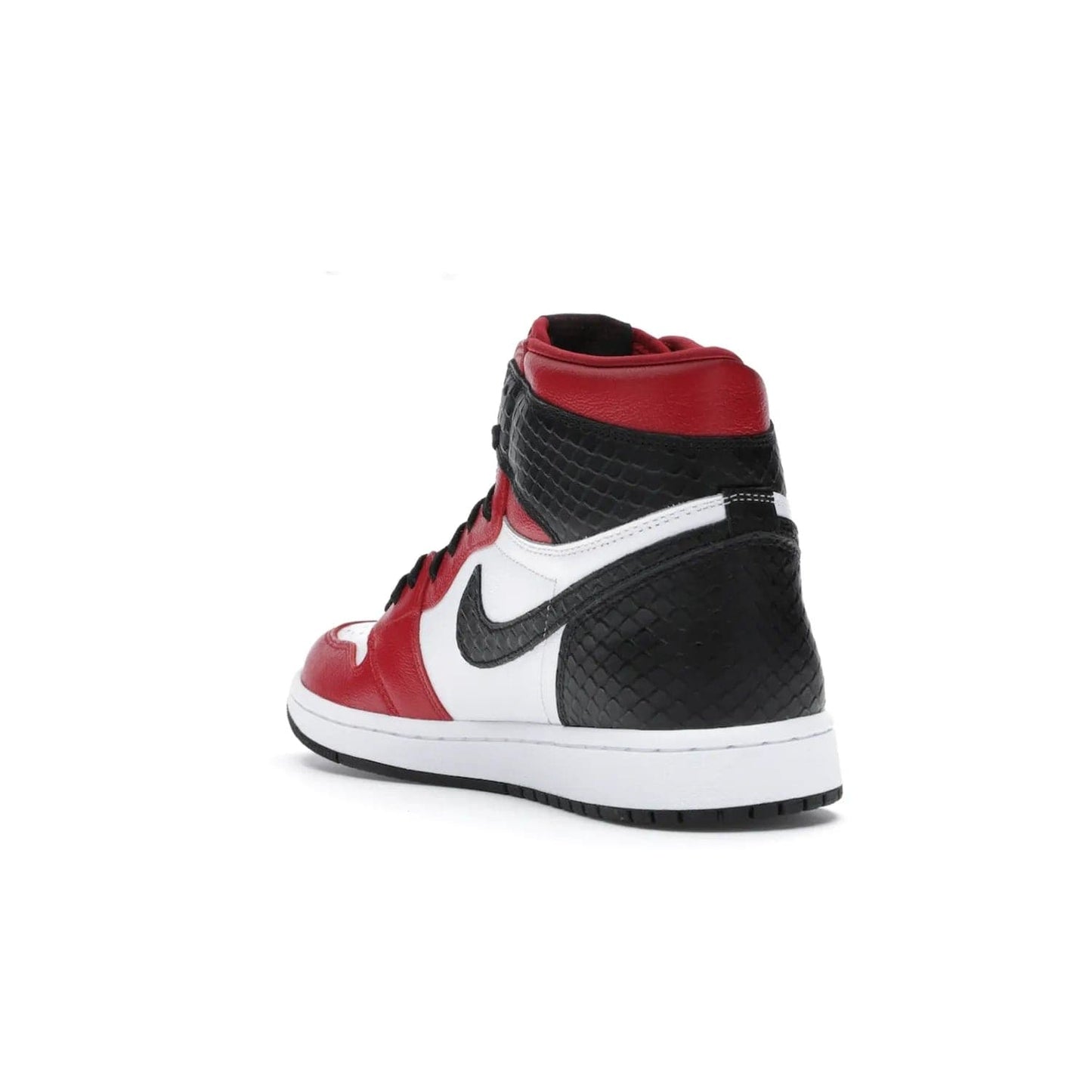 Jordan 1 Retro High Satin Snake Chicago (Women's) - Image 25 - Only at www.BallersClubKickz.com - Upscale Jordan 1 Retro High Satin Snake Chicago (Women's). Crafted from red and white leather with faux snakeskin details and red satin. Jordan Wings graphic on the ankle, white midsole, and striking red outsole. August 2020 release. Iconic shoes must-have for sneaker collectors.