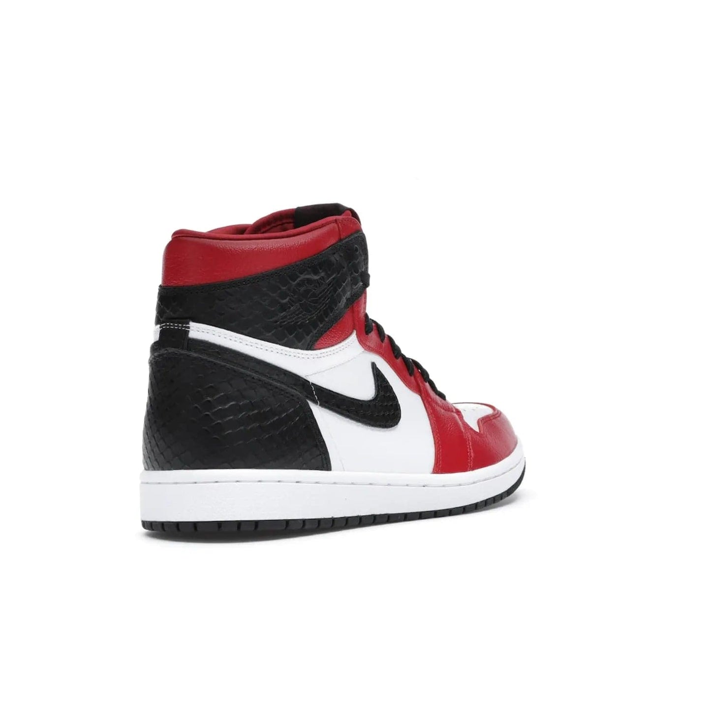 Jordan 1 Retro High Satin Snake Chicago (Women's) - Image 32 - Only at www.BallersClubKickz.com - Upscale Jordan 1 Retro High Satin Snake Chicago (Women's). Crafted from red and white leather with faux snakeskin details and red satin. Jordan Wings graphic on the ankle, white midsole, and striking red outsole. August 2020 release. Iconic shoes must-have for sneaker collectors.