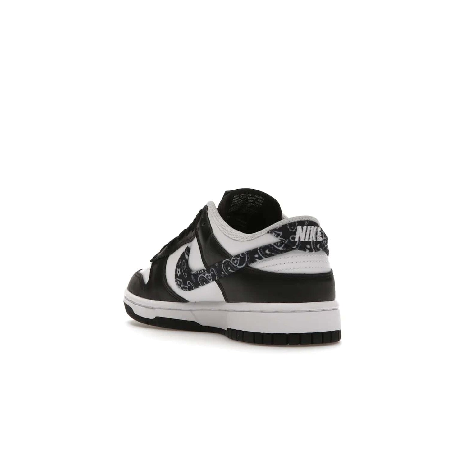 Nike Dunk Low Essential Paisley Pack Black (Women's) - Image 25 - Only at www.BallersClubKickz.com - Make a statement with the all-black Nike Dunk Low Essential Paisley Pack Black (Women's) featuring white leather overlays, a stunning paisley bandana print, and a white midsole for comfort and optimal grip on any surface.