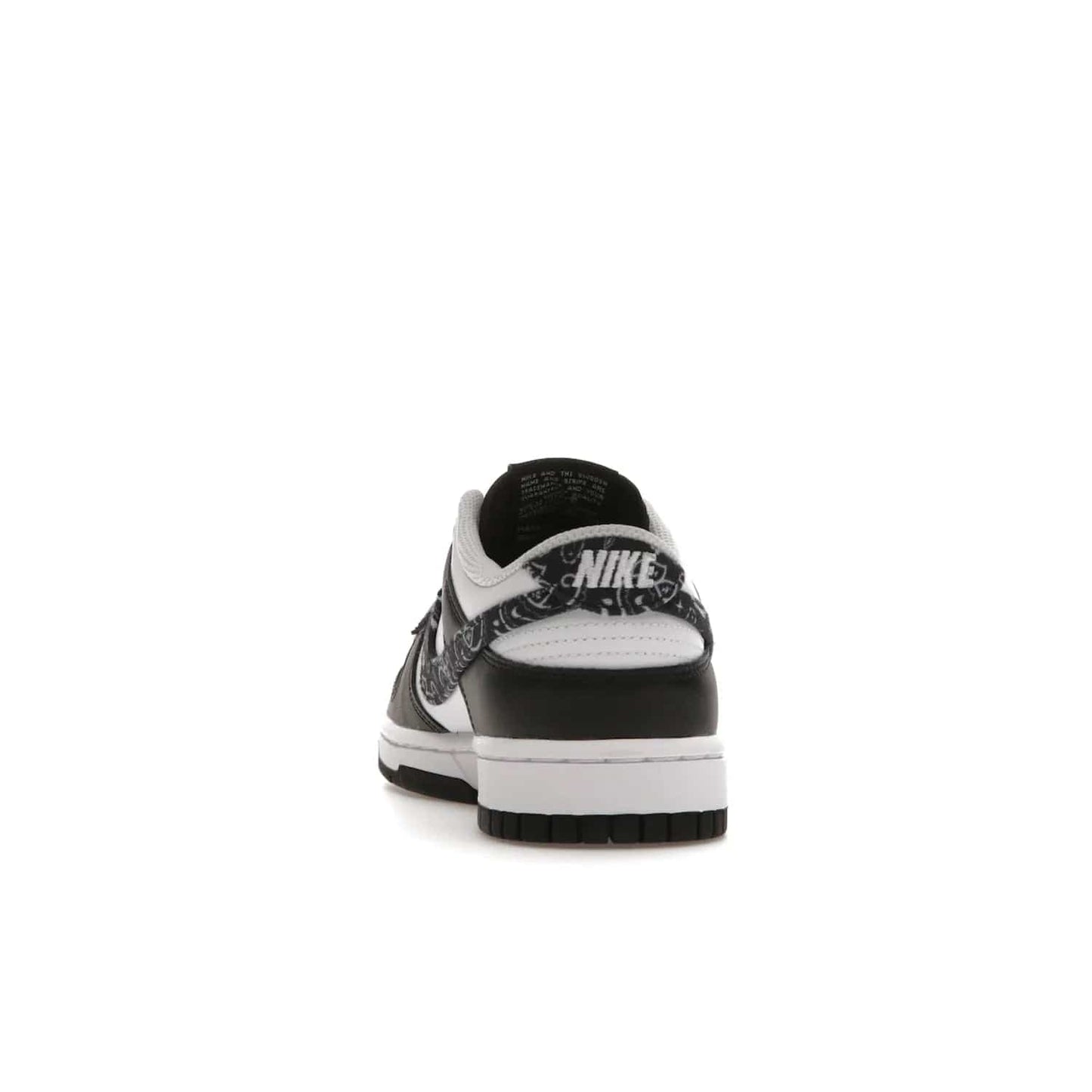 Nike Dunk Low Essential Paisley Pack Black (Women's) - Image 27 - Only at www.BallersClubKickz.com - Make a statement with the all-black Nike Dunk Low Essential Paisley Pack Black (Women's) featuring white leather overlays, a stunning paisley bandana print, and a white midsole for comfort and optimal grip on any surface.