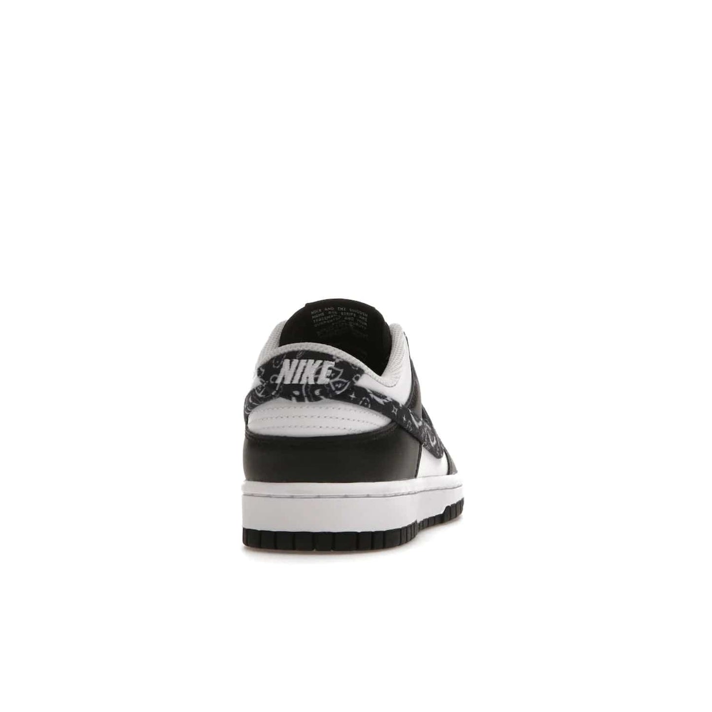 Nike Dunk Low Essential Paisley Pack Black (Women's) - Image 29 - Only at www.BallersClubKickz.com - Make a statement with the all-black Nike Dunk Low Essential Paisley Pack Black (Women's) featuring white leather overlays, a stunning paisley bandana print, and a white midsole for comfort and optimal grip on any surface.