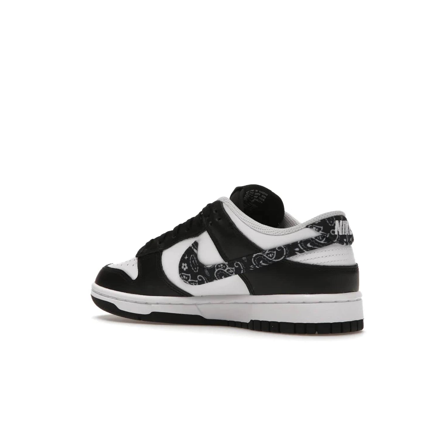 Nike Dunk Low Essential Paisley Pack Black (Women's) - Image 23 - Only at www.BallersClubKickz.com - Make a statement with the all-black Nike Dunk Low Essential Paisley Pack Black (Women's) featuring white leather overlays, a stunning paisley bandana print, and a white midsole for comfort and optimal grip on any surface.