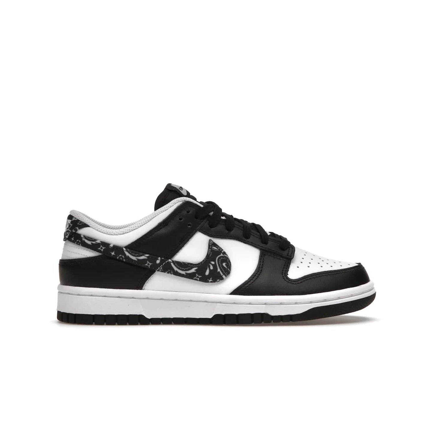 Nike Dunk Low Essential Paisley Pack Black (Women's) - Image 1 - Only at www.BallersClubKickz.com - Make a statement with the all-black Nike Dunk Low Essential Paisley Pack Black (Women's) featuring white leather overlays, a stunning paisley bandana print, and a white midsole for comfort and optimal grip on any surface.