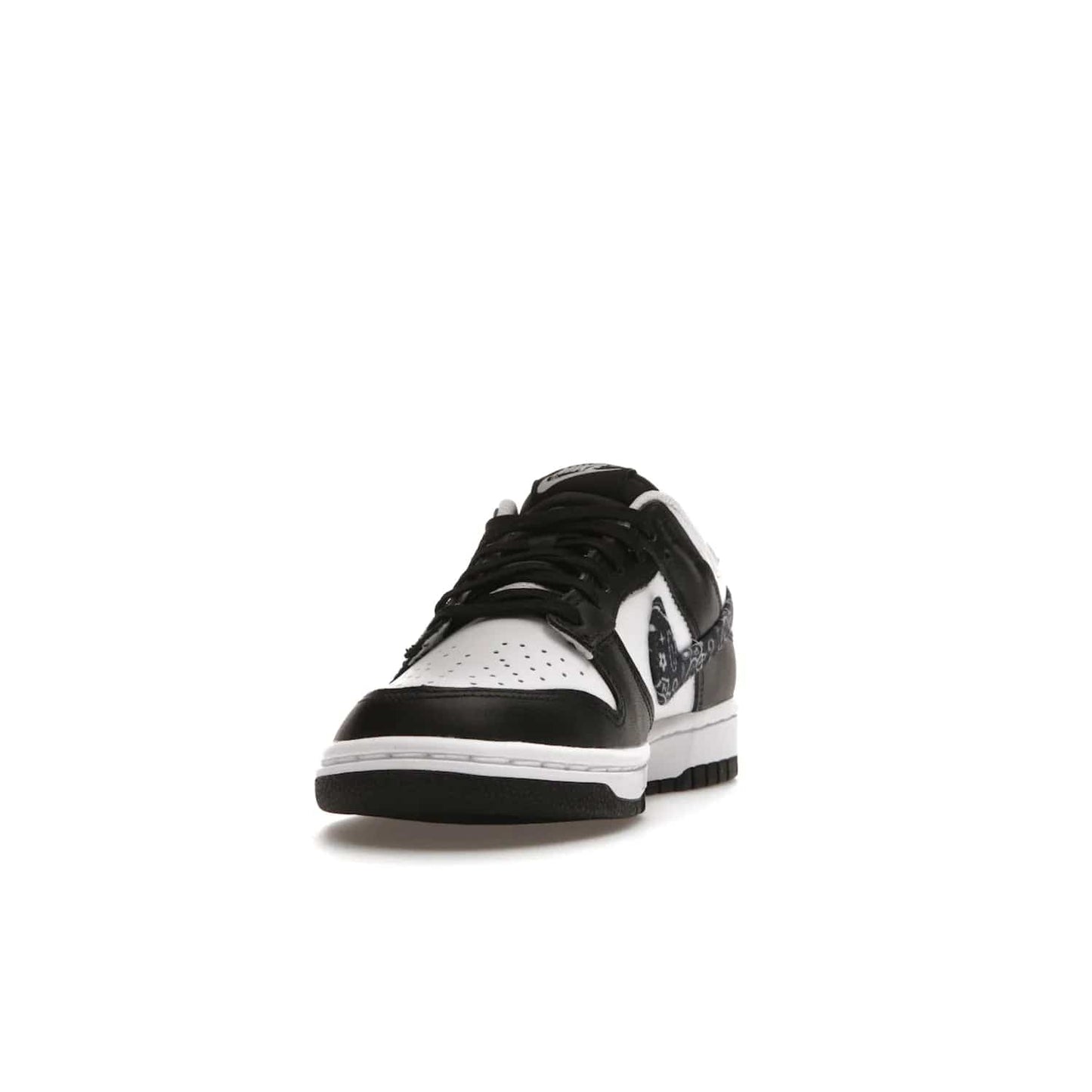 Nike Dunk Low Essential Paisley Pack Black (Women's) - Image 12 - Only at www.BallersClubKickz.com - Make a statement with the all-black Nike Dunk Low Essential Paisley Pack Black (Women's) featuring white leather overlays, a stunning paisley bandana print, and a white midsole for comfort and optimal grip on any surface.
