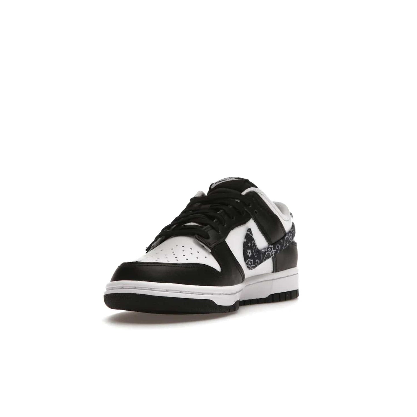 Nike Dunk Low Essential Paisley Pack Black (Women's) - Image 13 - Only at www.BallersClubKickz.com - Make a statement with the all-black Nike Dunk Low Essential Paisley Pack Black (Women's) featuring white leather overlays, a stunning paisley bandana print, and a white midsole for comfort and optimal grip on any surface.