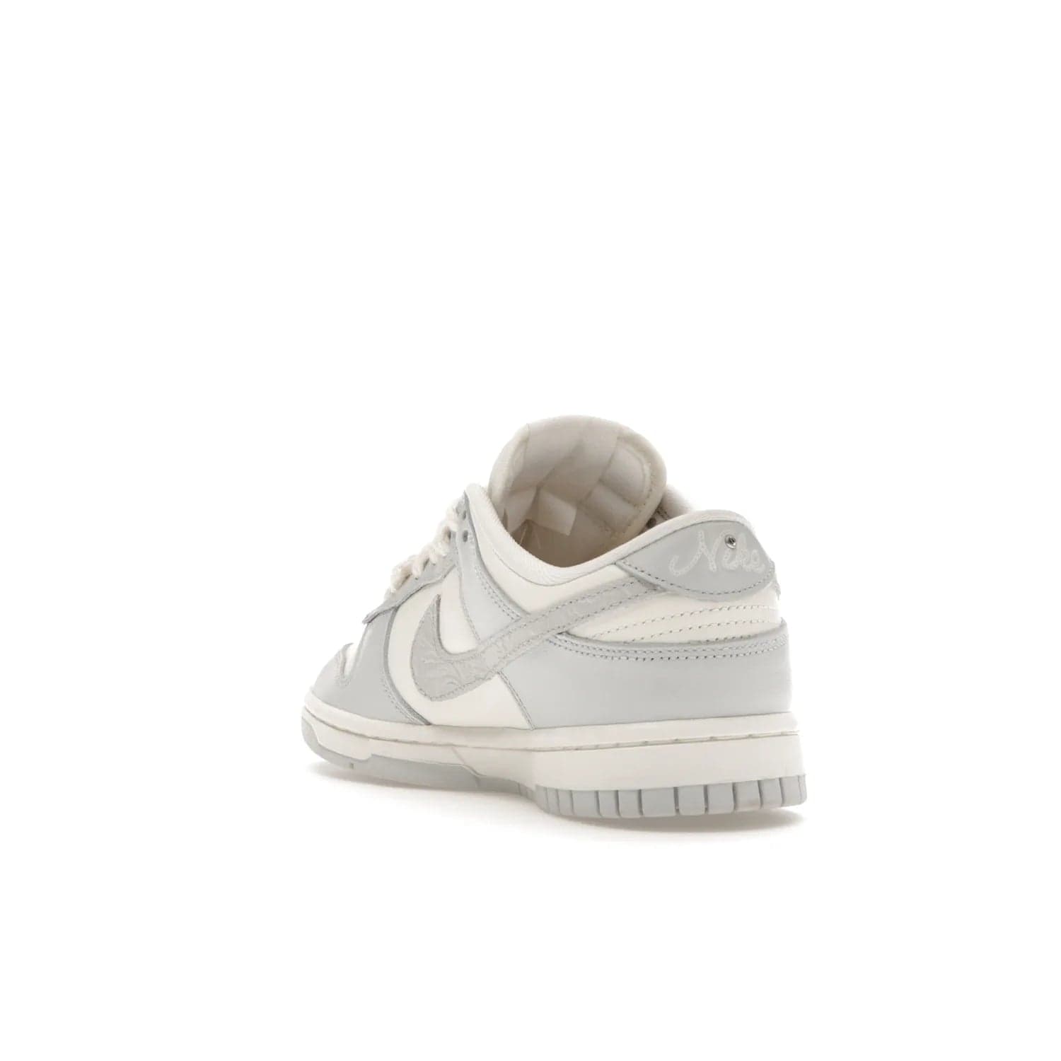 Nike Dunk Low Needlework Sail Aura (Women's) - Image 25 - Only at www.BallersClubKickz.com - Discover the Nike Dunk Low Needlework Sail Aura for Women. Boasting a beautiful Sail and Neutral Grey upper, this stylish sneaker offers durable materials with ultra-soft cushioning for all-day comfort. Get your pair today!