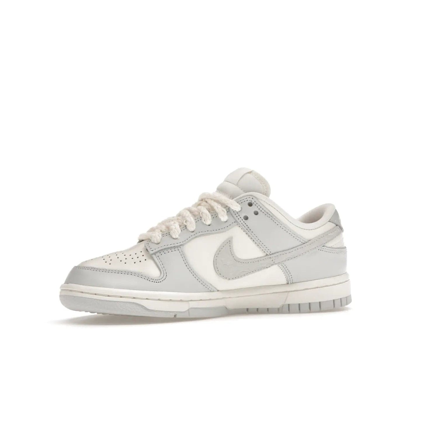 Nike Dunk Low Needlework Sail Aura (Women's) - Image 17 - Only at www.BallersClubKickz.com - Discover the Nike Dunk Low Needlework Sail Aura for Women. Boasting a beautiful Sail and Neutral Grey upper, this stylish sneaker offers durable materials with ultra-soft cushioning for all-day comfort. Get your pair today!