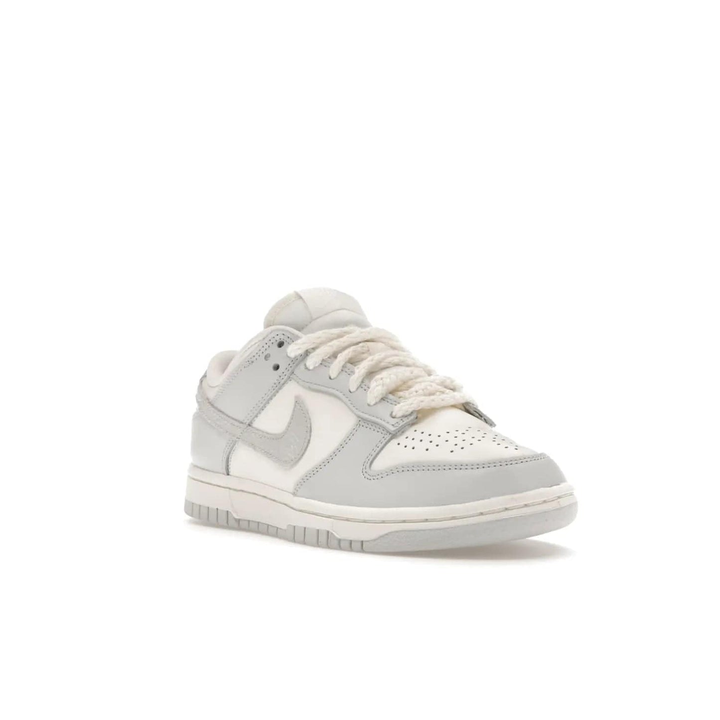 Nike Dunk Low Needlework Sail Aura (Women's) - Image 6 - Only at www.BallersClubKickz.com - Discover the Nike Dunk Low Needlework Sail Aura for Women. Boasting a beautiful Sail and Neutral Grey upper, this stylish sneaker offers durable materials with ultra-soft cushioning for all-day comfort. Get your pair today!