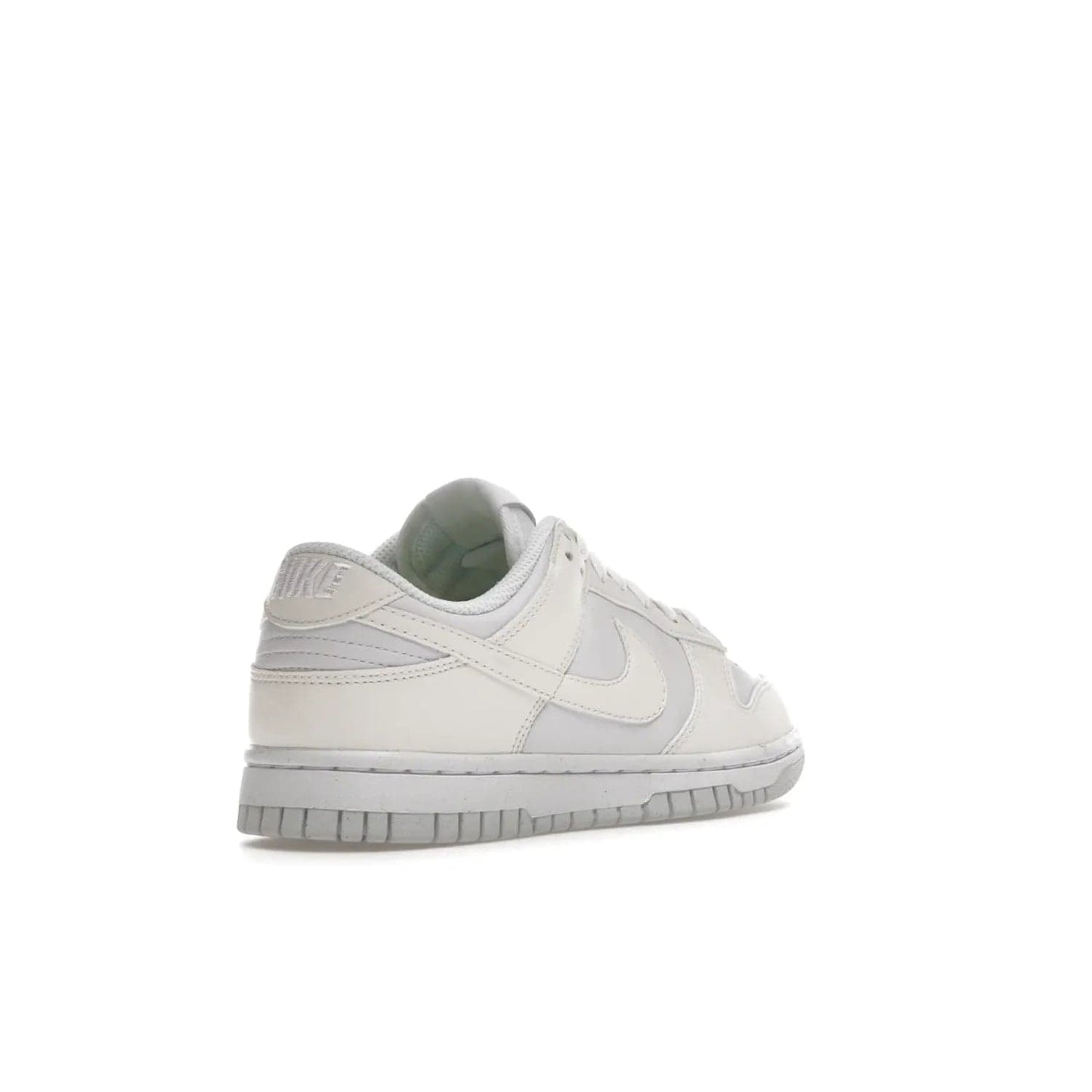Nike Dunk Low Next Nature Sail (Women's) - Image 32 - Only at www.BallersClubKickz.com - The Nike Dunk Low Next Nature Sail delivers iconic style with sustainable innovation. This two-tone black and white Flyleather upper, constructed with 50% recycled materials, offers a stylish yet eco-friendly look. Available November 2021 for $100.