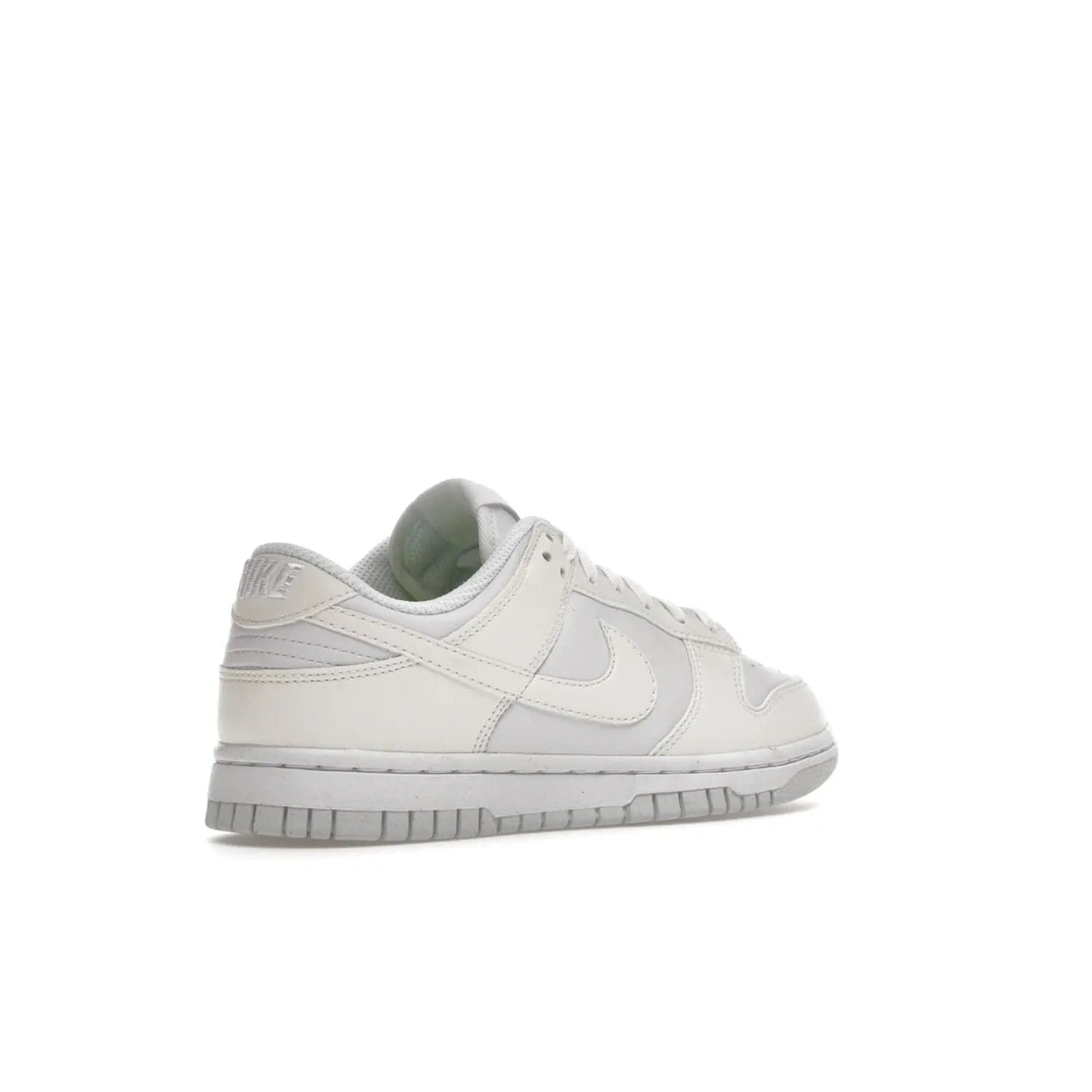 Nike Dunk Low Next Nature Sail (Women's) - Image 33 - Only at www.BallersClubKickz.com - The Nike Dunk Low Next Nature Sail delivers iconic style with sustainable innovation. This two-tone black and white Flyleather upper, constructed with 50% recycled materials, offers a stylish yet eco-friendly look. Available November 2021 for $100.