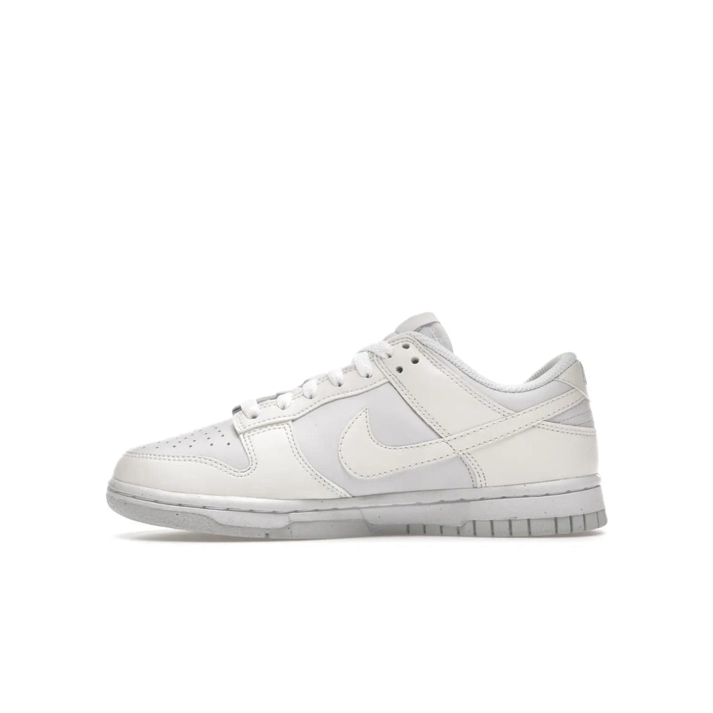 Nike Dunk Low Next Nature Sail (Women's) - Image 19 - Only at www.BallersClubKickz.com - The Nike Dunk Low Next Nature Sail delivers iconic style with sustainable innovation. This two-tone black and white Flyleather upper, constructed with 50% recycled materials, offers a stylish yet eco-friendly look. Available November 2021 for $100.