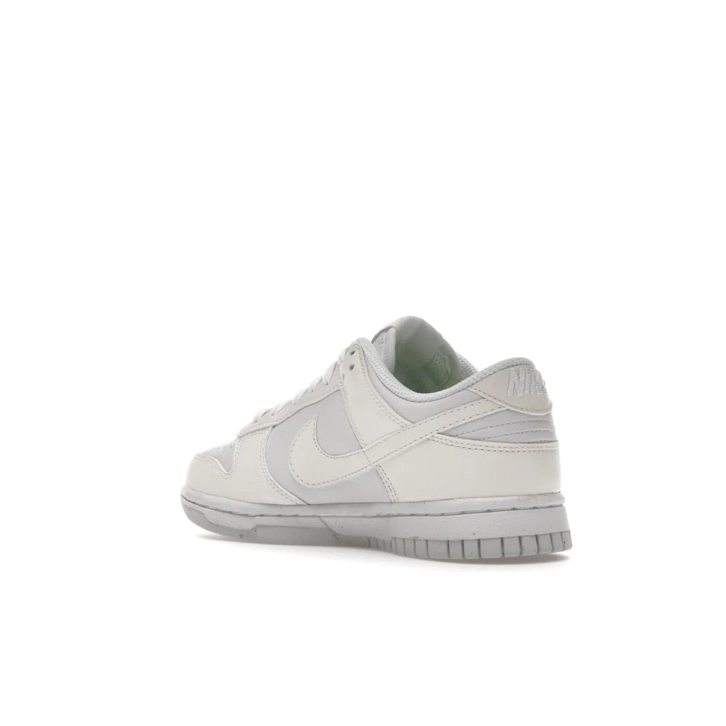 Nike Dunk Low Next Nature Sail (Women's) - Image 24 - Only at www.BallersClubKickz.com - The Nike Dunk Low Next Nature Sail delivers iconic style with sustainable innovation. This two-tone black and white Flyleather upper, constructed with 50% recycled materials, offers a stylish yet eco-friendly look. Available November 2021 for $100.