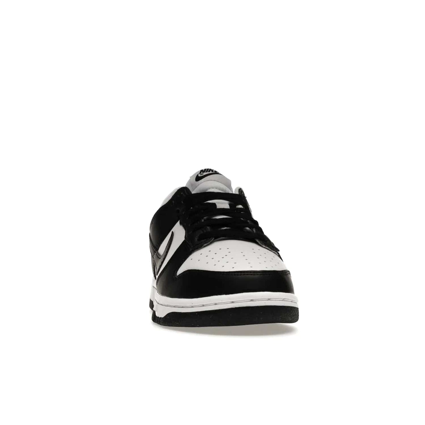 Nike Dunk Low Next Nature White Black Panda (Women's) - Image 9 - Only at www.BallersClubKickz.com - Experience sustainable fashion with the Women's Nike Dunk Low Next Nature White Black. Made with 50% recycled materials, this shoe offers a two-tone black and white Flyleather upper, matching soles and woven tongue labels. Available in November 2021.