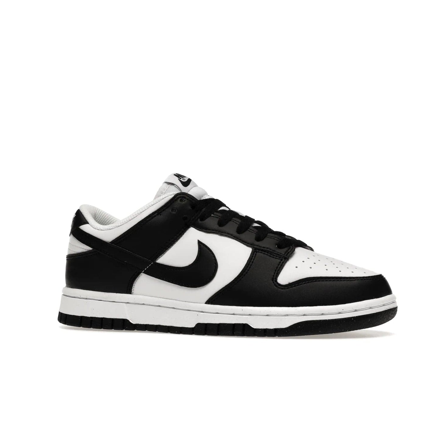 Nike Dunk Low Next Nature White Black Panda (Women's) - Image 3 - Only at www.BallersClubKickz.com - Experience sustainable fashion with the Women's Nike Dunk Low Next Nature White Black. Made with 50% recycled materials, this shoe offers a two-tone black and white Flyleather upper, matching soles and woven tongue labels. Available in November 2021.