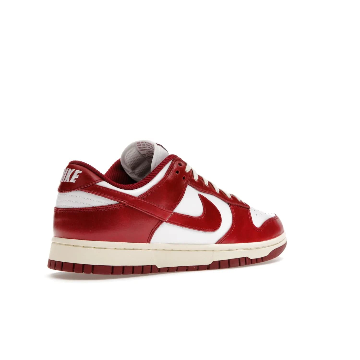 Nike Dunk Low PRM Vintage Team Red (Women's) - Image 33 - Only at www.BallersClubKickz.com - Shop the stylish Nike Dunk Low PRM Vintage Team Red. Signature Red and White leather with Coconut Milk midsoles for an aged finish. 21 April 2023 release.