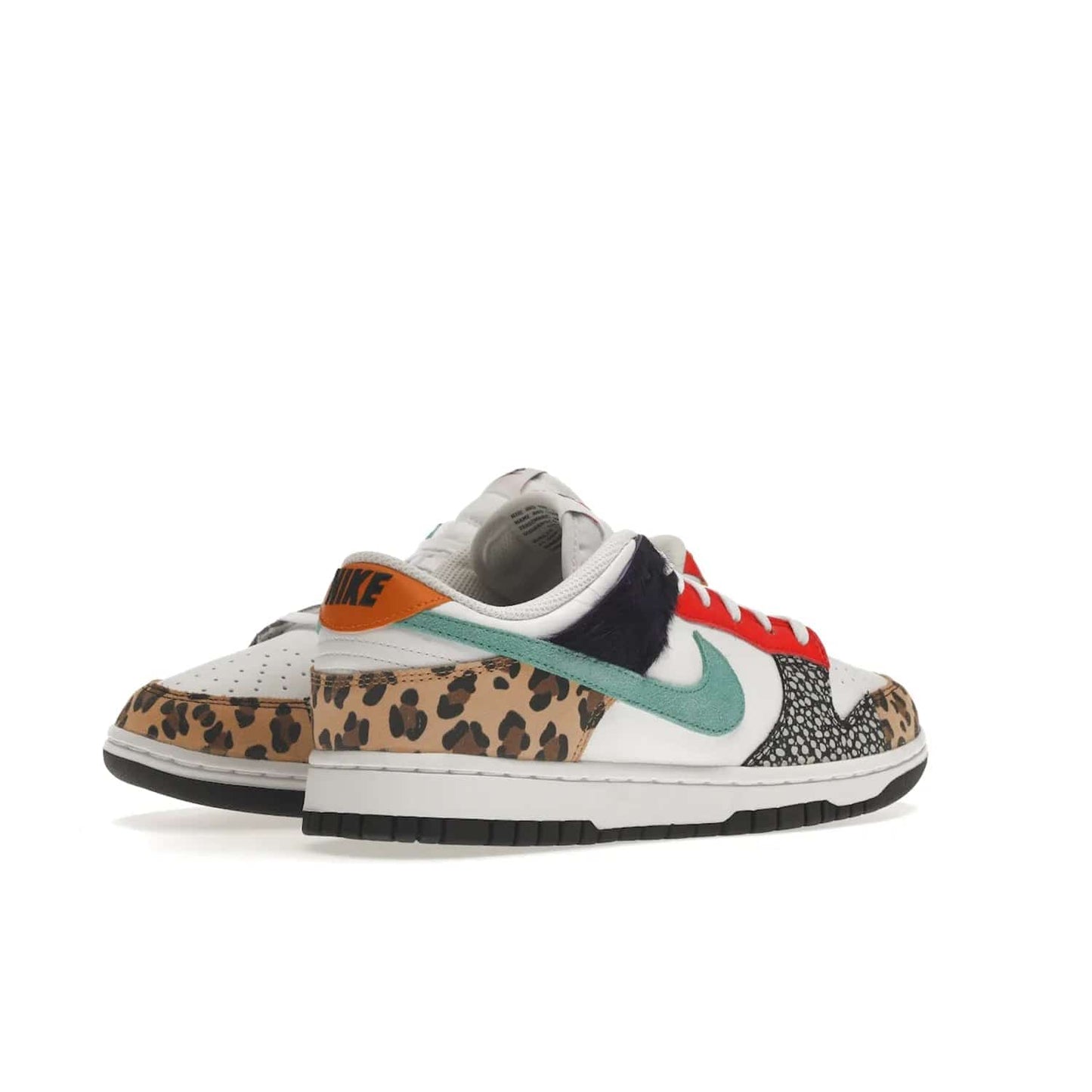 Nike Dunk Low Safari Mix (Women's) - Image 33 - Only at www.BallersClubKickz.com - Express your unique style with the Women’s Nike Dunk Low Safari Mix. Featuring a vibrant mix of white leather, leopard Durabuck, faux-horsehair, suede, and more, this stylish sneaker will turn heads. Shop now for a bold look at an affordable $120 price tag. Available in May 2022.