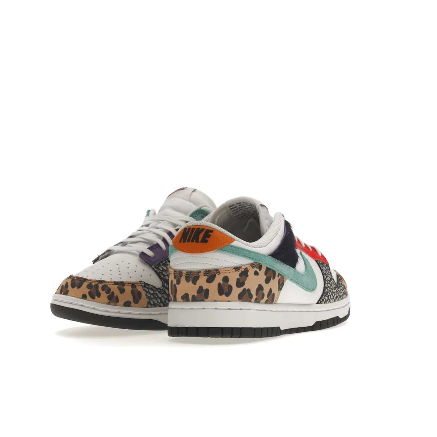 Nike Dunk Low Safari Mix (Women's) - Image 31 - Only at www.BallersClubKickz.com - Express your unique style with the Women’s Nike Dunk Low Safari Mix. Featuring a vibrant mix of white leather, leopard Durabuck, faux-horsehair, suede, and more, this stylish sneaker will turn heads. Shop now for a bold look at an affordable $120 price tag. Available in May 2022.