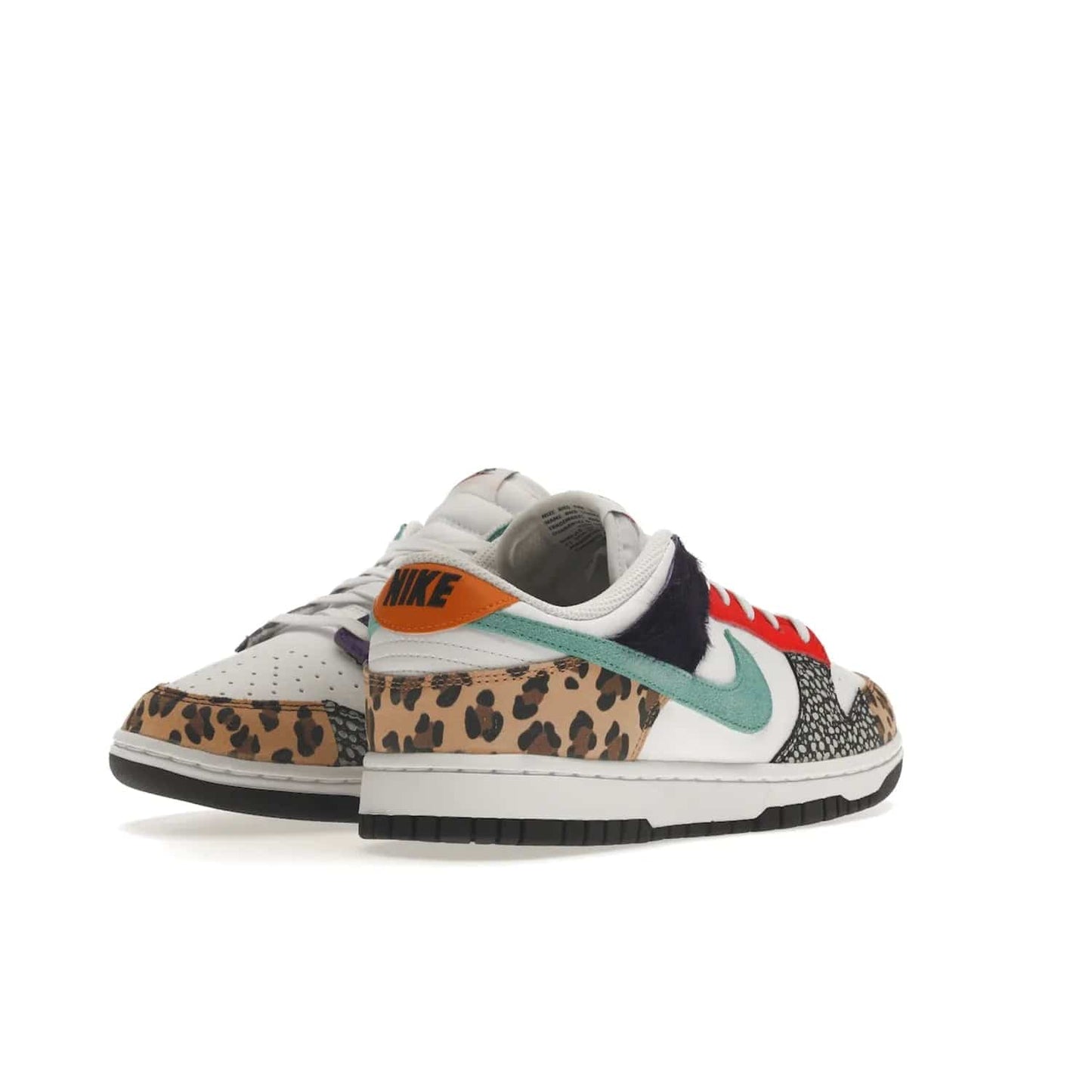 Nike Dunk Low Safari Mix (Women's) - Image 32 - Only at www.BallersClubKickz.com - Express your unique style with the Women’s Nike Dunk Low Safari Mix. Featuring a vibrant mix of white leather, leopard Durabuck, faux-horsehair, suede, and more, this stylish sneaker will turn heads. Shop now for a bold look at an affordable $120 price tag. Available in May 2022.