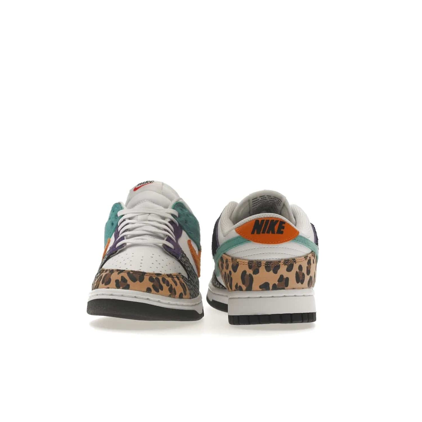 Nike Dunk Low Safari Mix (Women's) - Image 28 - Only at www.BallersClubKickz.com - Express your unique style with the Women’s Nike Dunk Low Safari Mix. Featuring a vibrant mix of white leather, leopard Durabuck, faux-horsehair, suede, and more, this stylish sneaker will turn heads. Shop now for a bold look at an affordable $120 price tag. Available in May 2022.