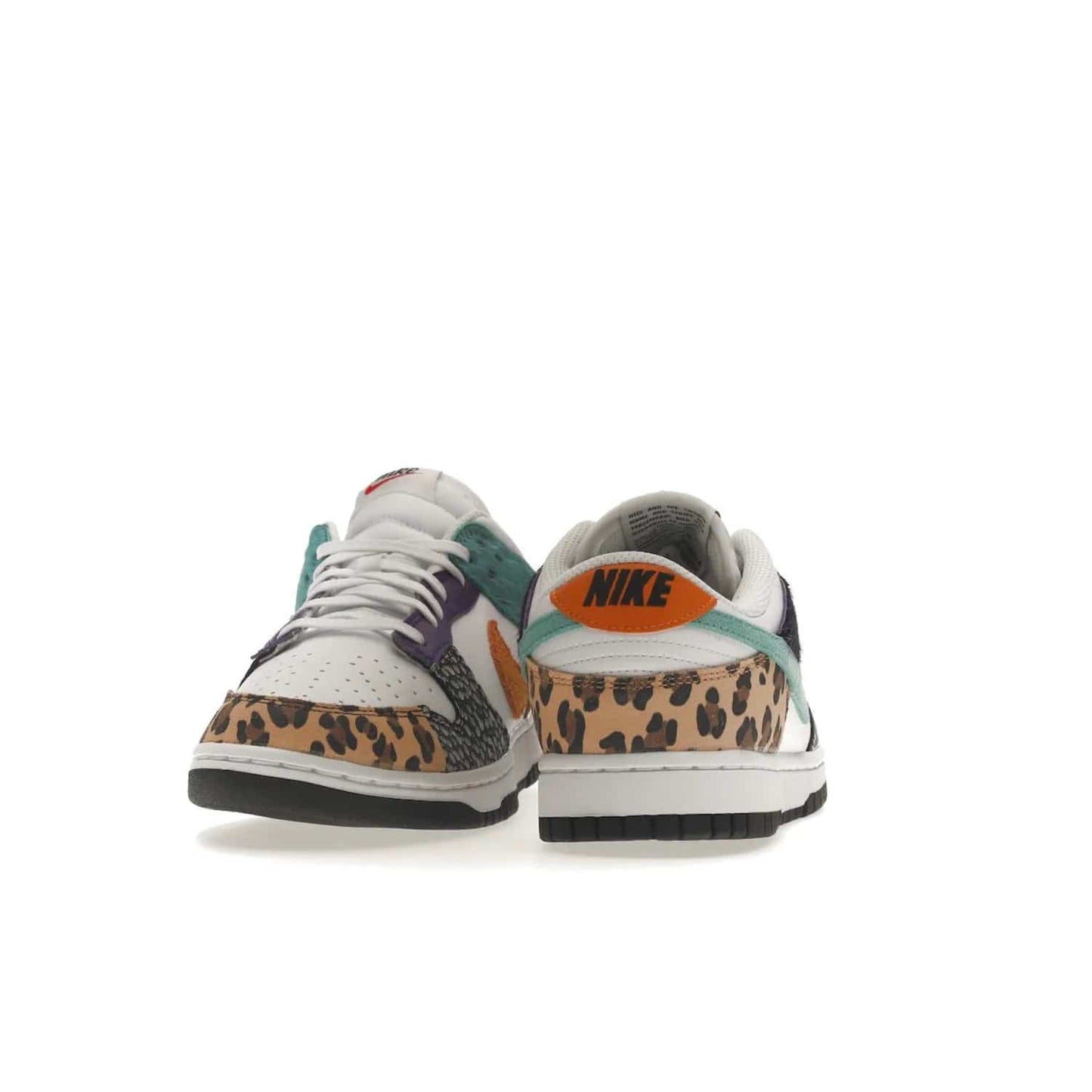 Nike Dunk Low Safari Mix (Women's) - Image 29 - Only at www.BallersClubKickz.com - Express your unique style with the Women’s Nike Dunk Low Safari Mix. Featuring a vibrant mix of white leather, leopard Durabuck, faux-horsehair, suede, and more, this stylish sneaker will turn heads. Shop now for a bold look at an affordable $120 price tag. Available in May 2022.