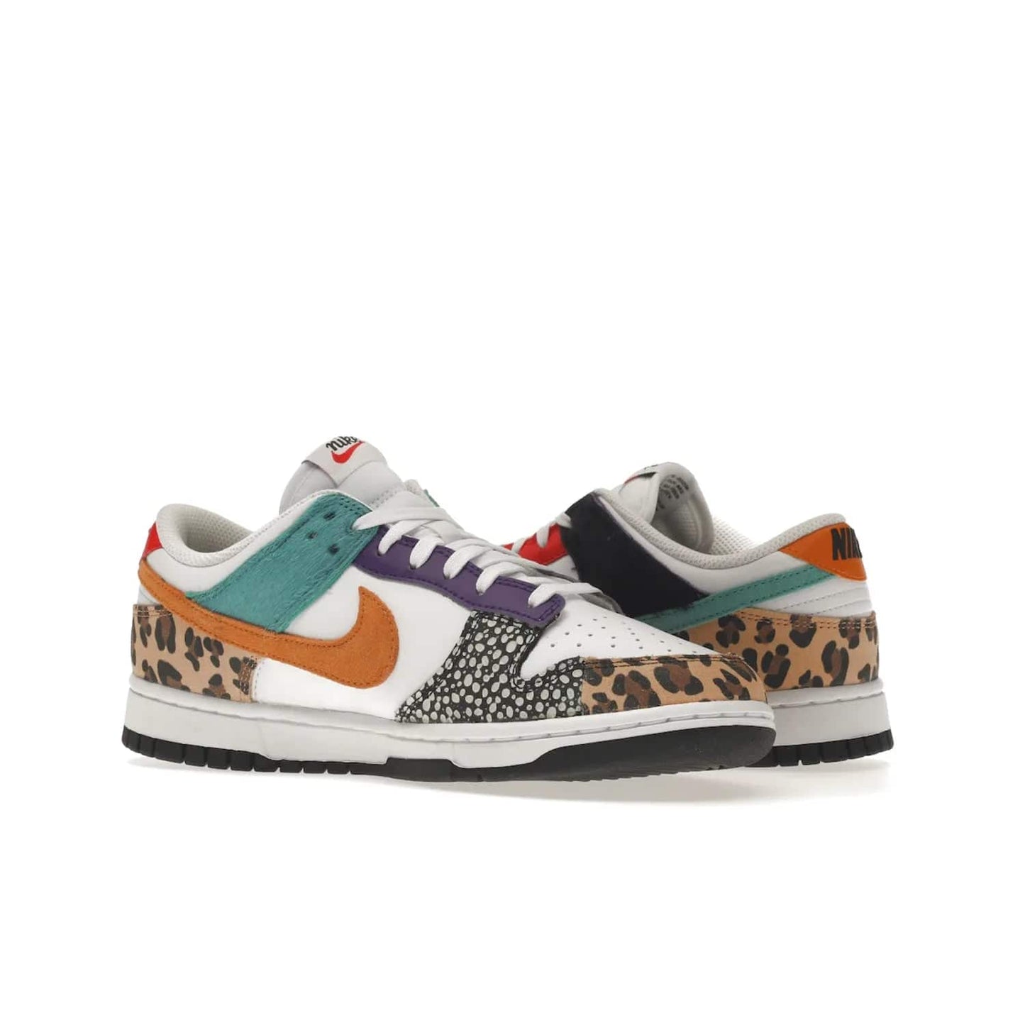 Nike Dunk Low Safari Mix (Women's) - Image 22 - Only at www.BallersClubKickz.com - Express your unique style with the Women’s Nike Dunk Low Safari Mix. Featuring a vibrant mix of white leather, leopard Durabuck, faux-horsehair, suede, and more, this stylish sneaker will turn heads. Shop now for a bold look at an affordable $120 price tag. Available in May 2022.